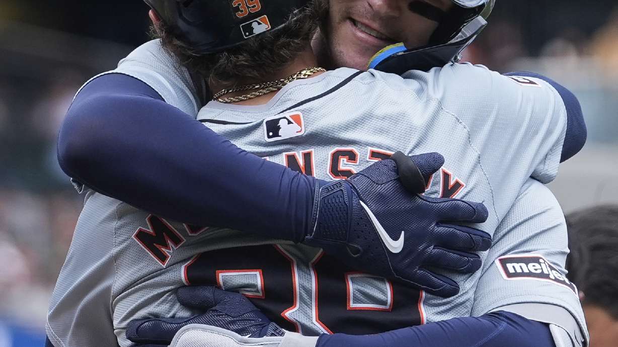 Detroit Tigers' Dillon Dingler, right, celebrates with Zach McKinstry after hitting a two-run home run against the San Francisco Giants during the second inning of a baseball game Sunday, Aug. 11, 2024, in San Francisco.