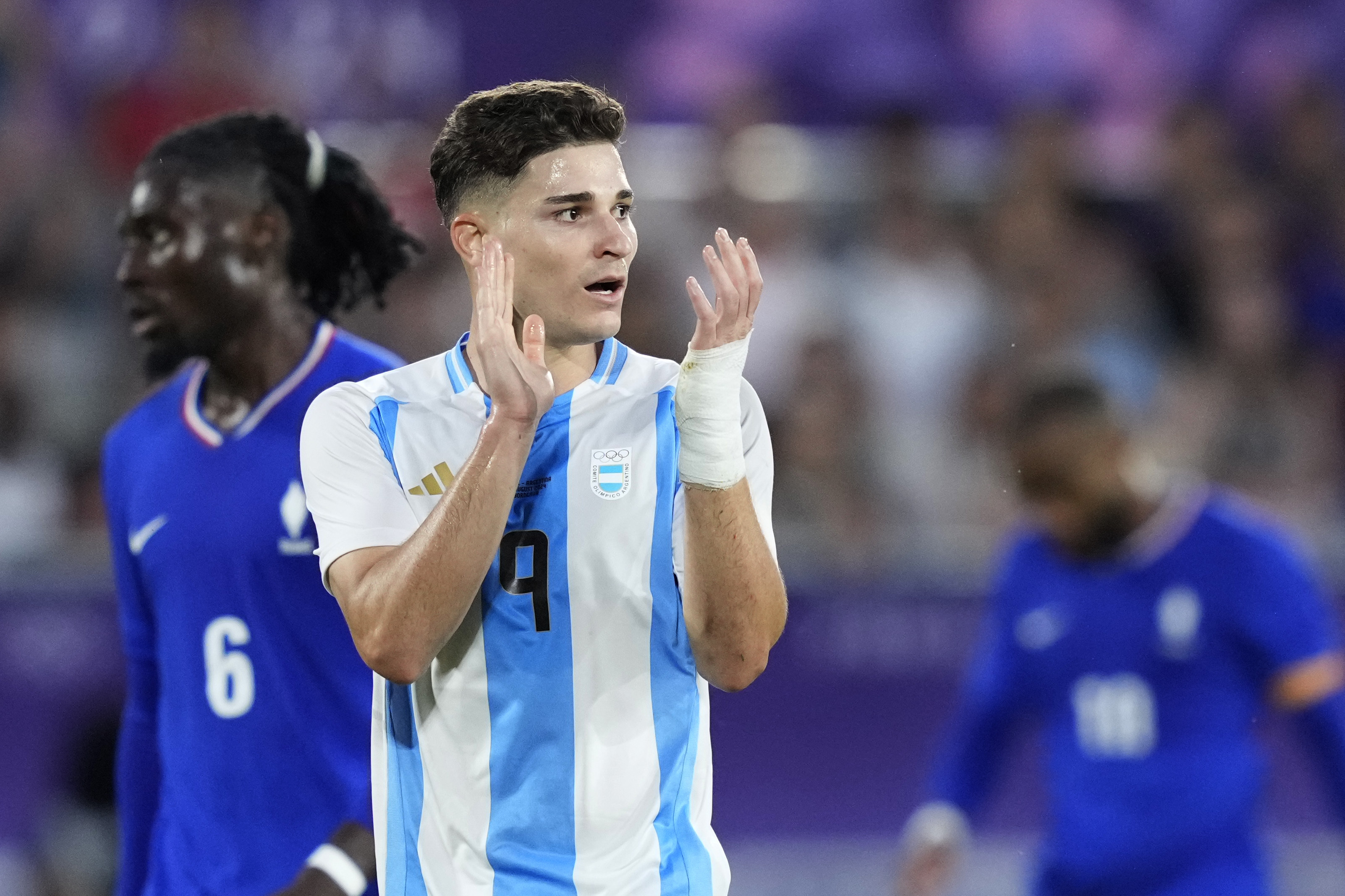 Argentina's Julian Alvarez reacts during a quarter final soccer match between France and Argentina, at Bordeaux Stadium, during the 2024 Summer Olympics, Friday, Aug. 2, 2024, in Bordeaux, France.