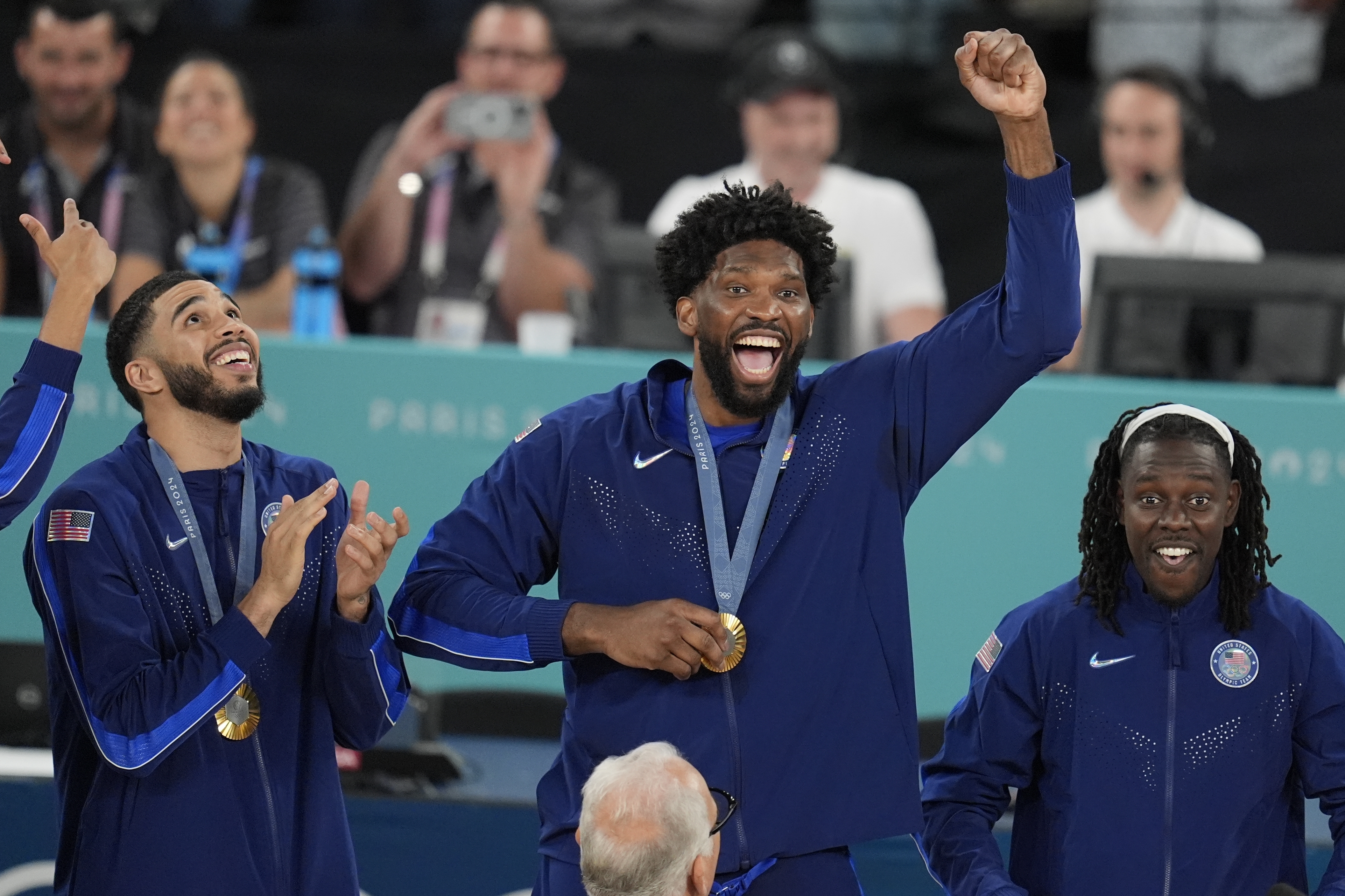 United States' Joel Embiid (11) celebrates after winning a men's gold medal basketball game against France at Bercy Arena at the 2024 Summer Olympics, Saturday, Aug. 10, 2024, in Paris, France.