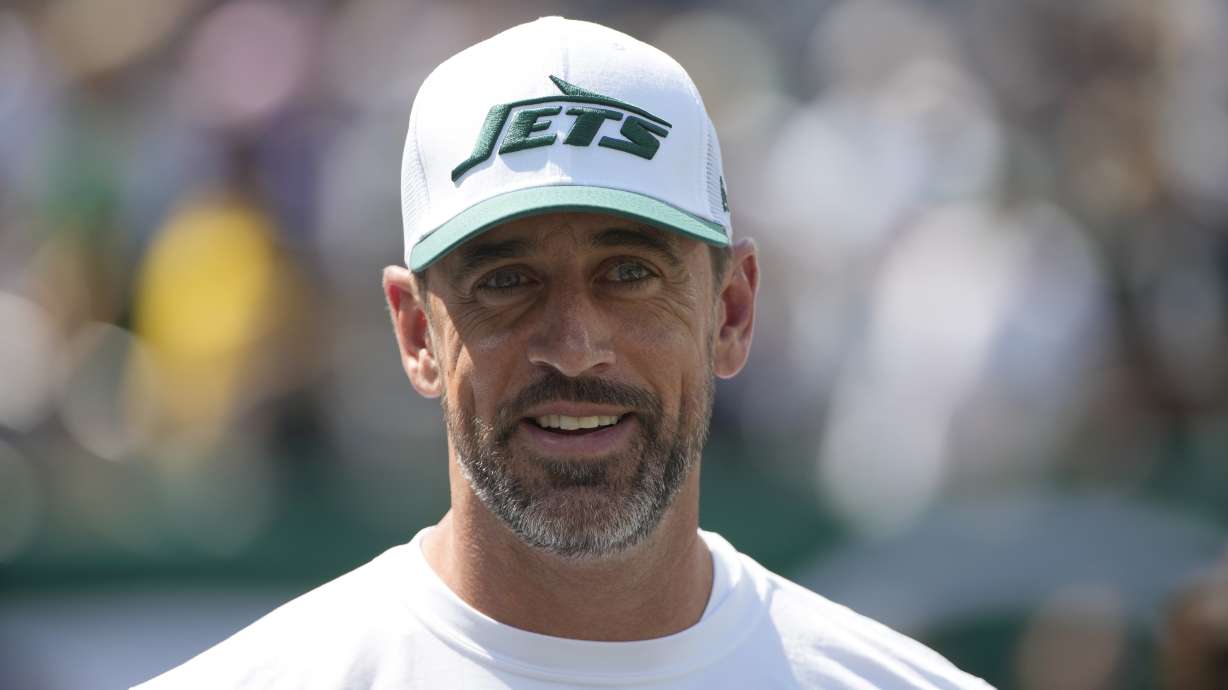 New York Jets quarterback Aaron Rodgers is seen before the start of an NFL preseason football game between the Washington Commanders and New York Jets Saturday, Aug. 10, 2024, in East Rutherford. N.J.