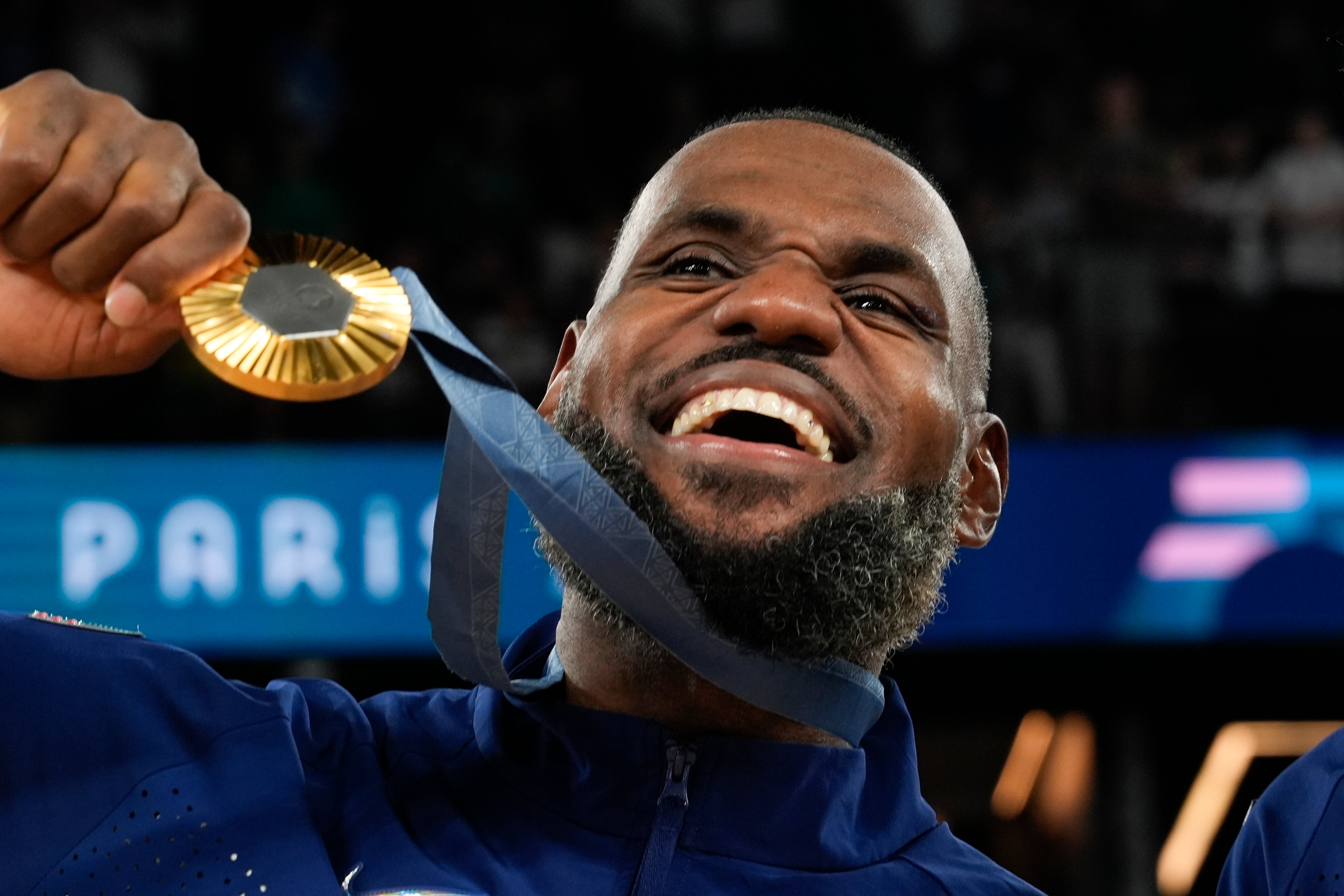 United States' LeBron James celebrates after beating France to win the gold medal during a men's gold medal basketball game at Bercy Arena at the 2024 Summer Olympics, Sunday in Paris, France. American athletes led the medal count with 40 gold, 44 silver and 42 bronze.
