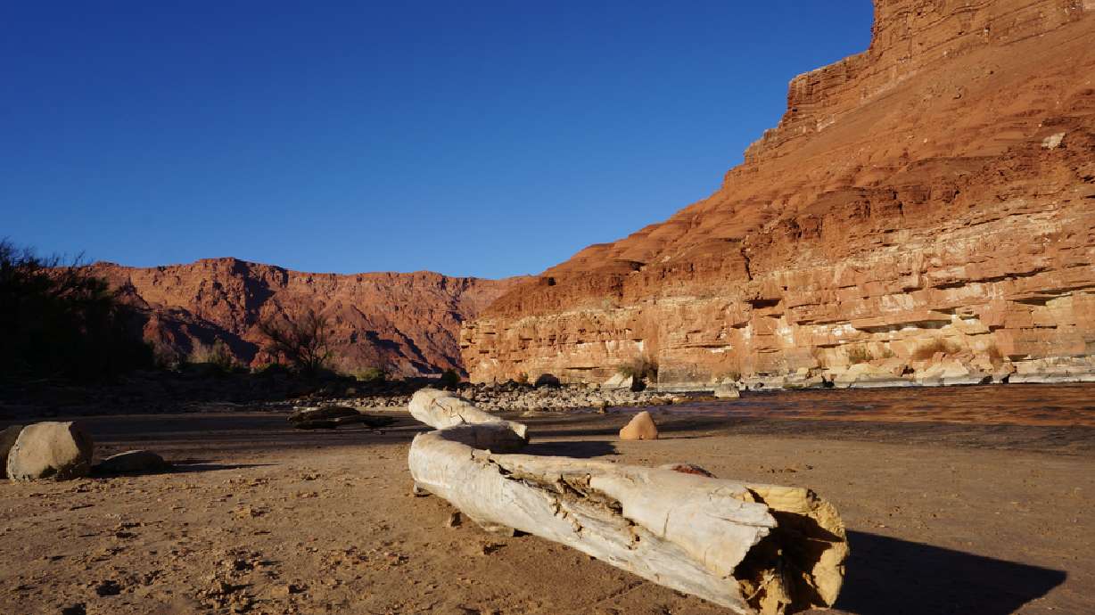 The Colorado River flows near the Lees Ferry Campground along the Arizona side of the Glen Canyon National Recreation Area. Park officials are proposing a 30% camping fee change that would go into effect in 2025.