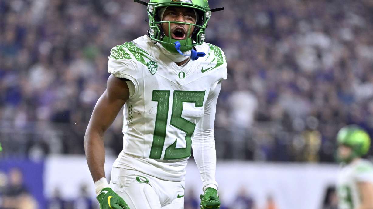 FILE - Oregon wide receiver Tez Johnson reacts after a touchdown against Washington during the second half of the Pac-12 championship NCAA college football game Friday, Dec. 1, 2023, in Las Vegas.