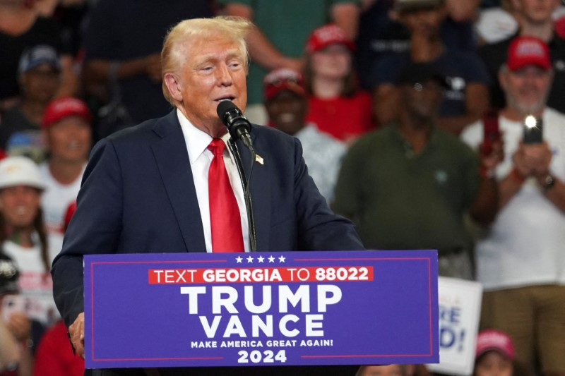 Donald Trump speaks during a rally with Sen. JD Vance, in Atlanta, Georgia, Aug. 3. The FBI says it's investigating after Trump's campaign said its internal communications were hacked, and the campaign blamed the Iranian government.