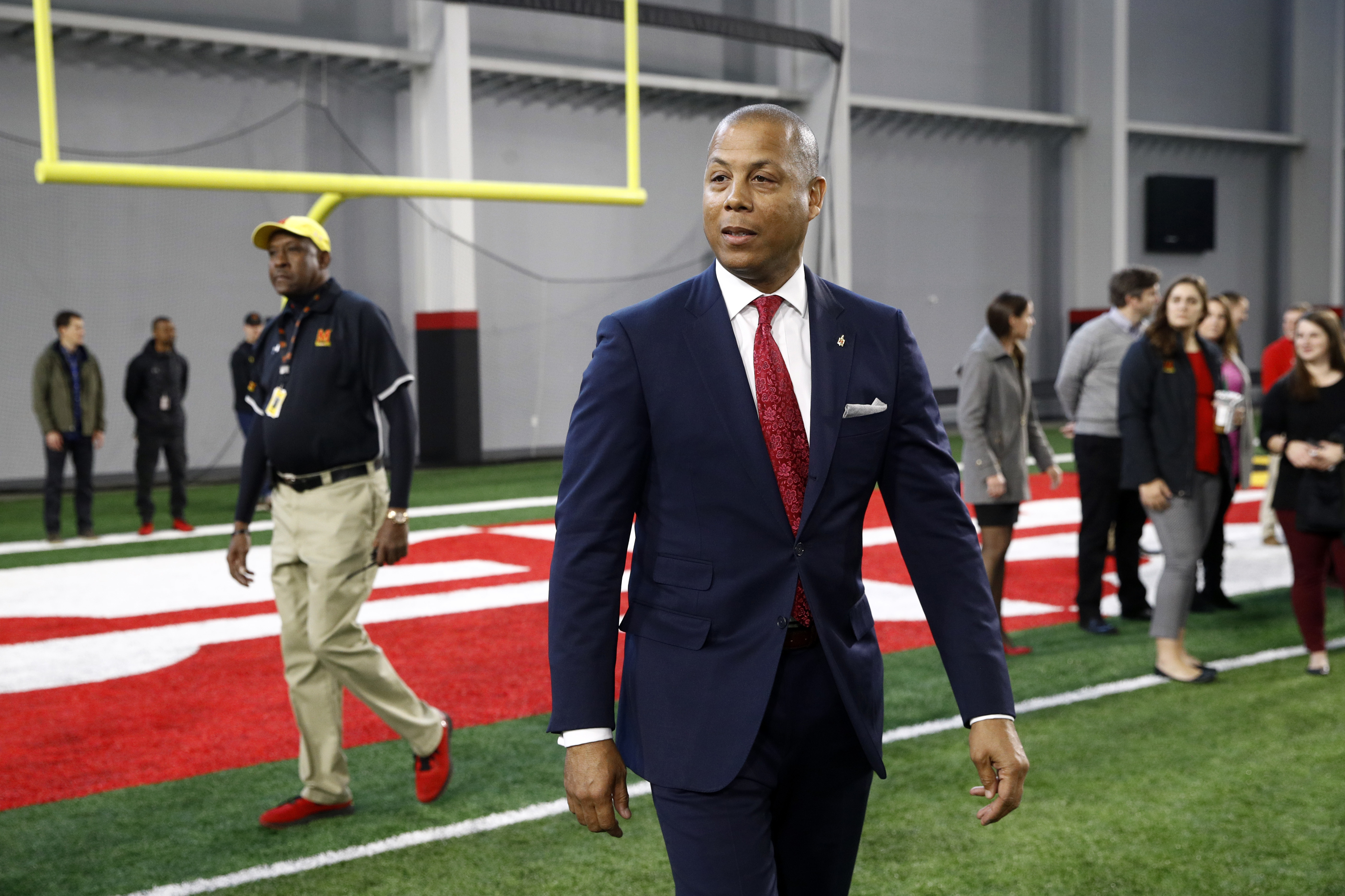 FILE - Maryland athletic director Damon Evans arrives at an NCAA college football news conference, Dec. 6, 2018, in College Park, Md. 