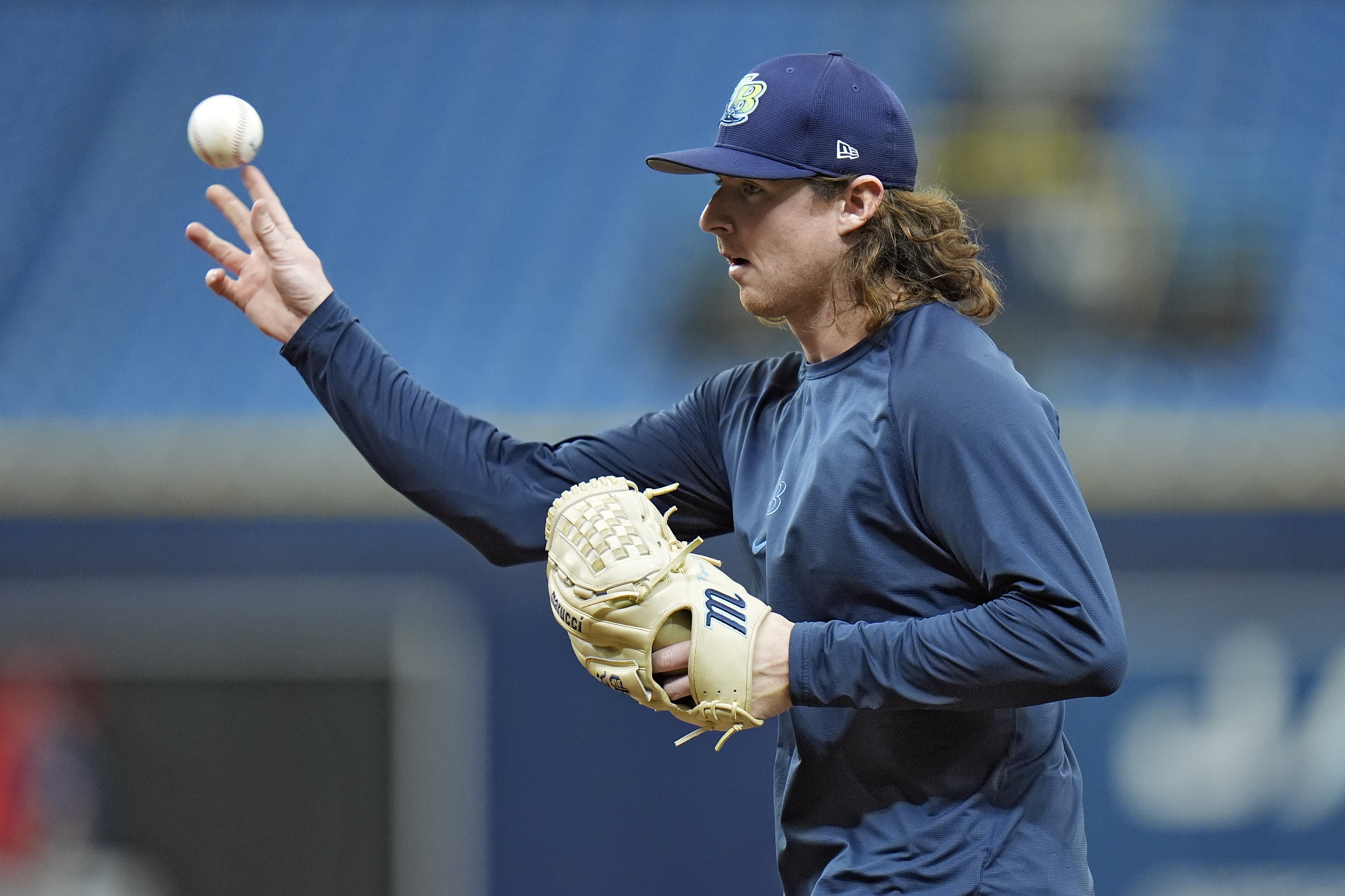 Tampa Bay Rays pitcher Ryan Pepiot warms up before a baseball game against the Houston Astros Monday, Aug. 12, 2024, in St. Petersburg, Fla. Pepiot has on the injured list with a leg infection.