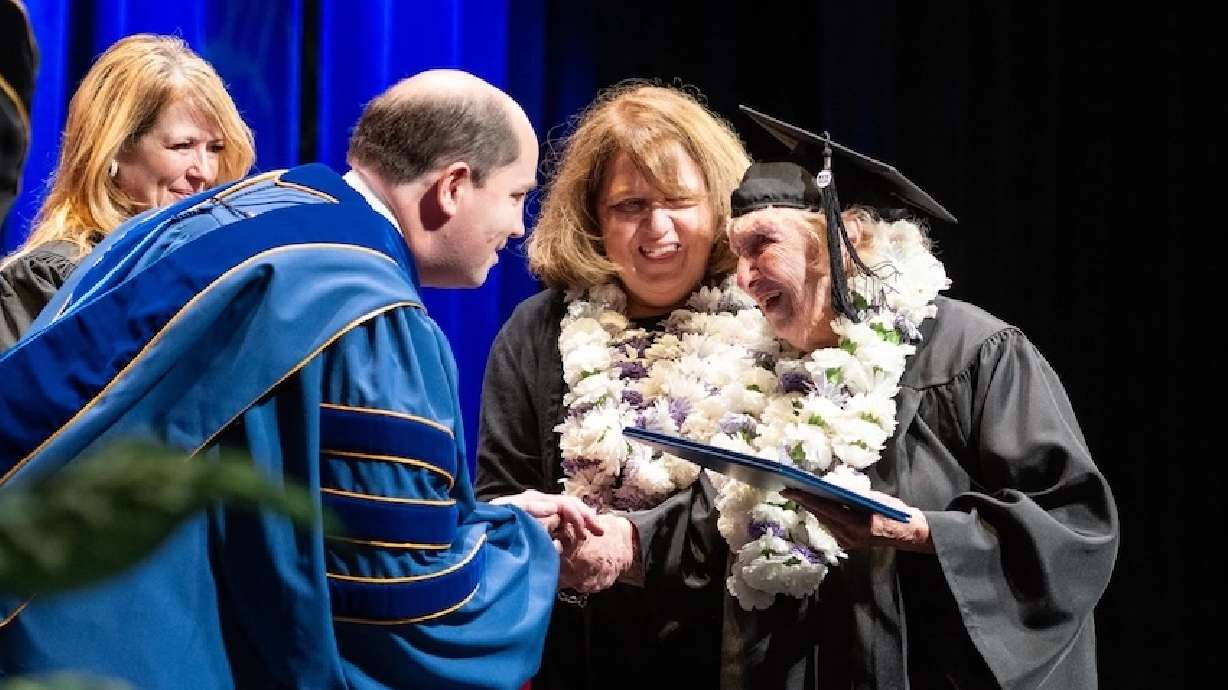 Helen Holland, right, graduated with her associate’s degree from Brigham Young University-Idaho on July 25 at the age of 101.