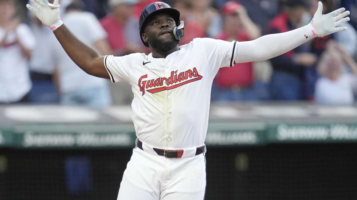 Cleveland Guardians' Jhonkensy Noel celebrates as he crosses home plate with a home run in the fourth inning of a baseball game against the Chicago Cubs, Monday, Aug. 12, 2024, in Cleveland.
