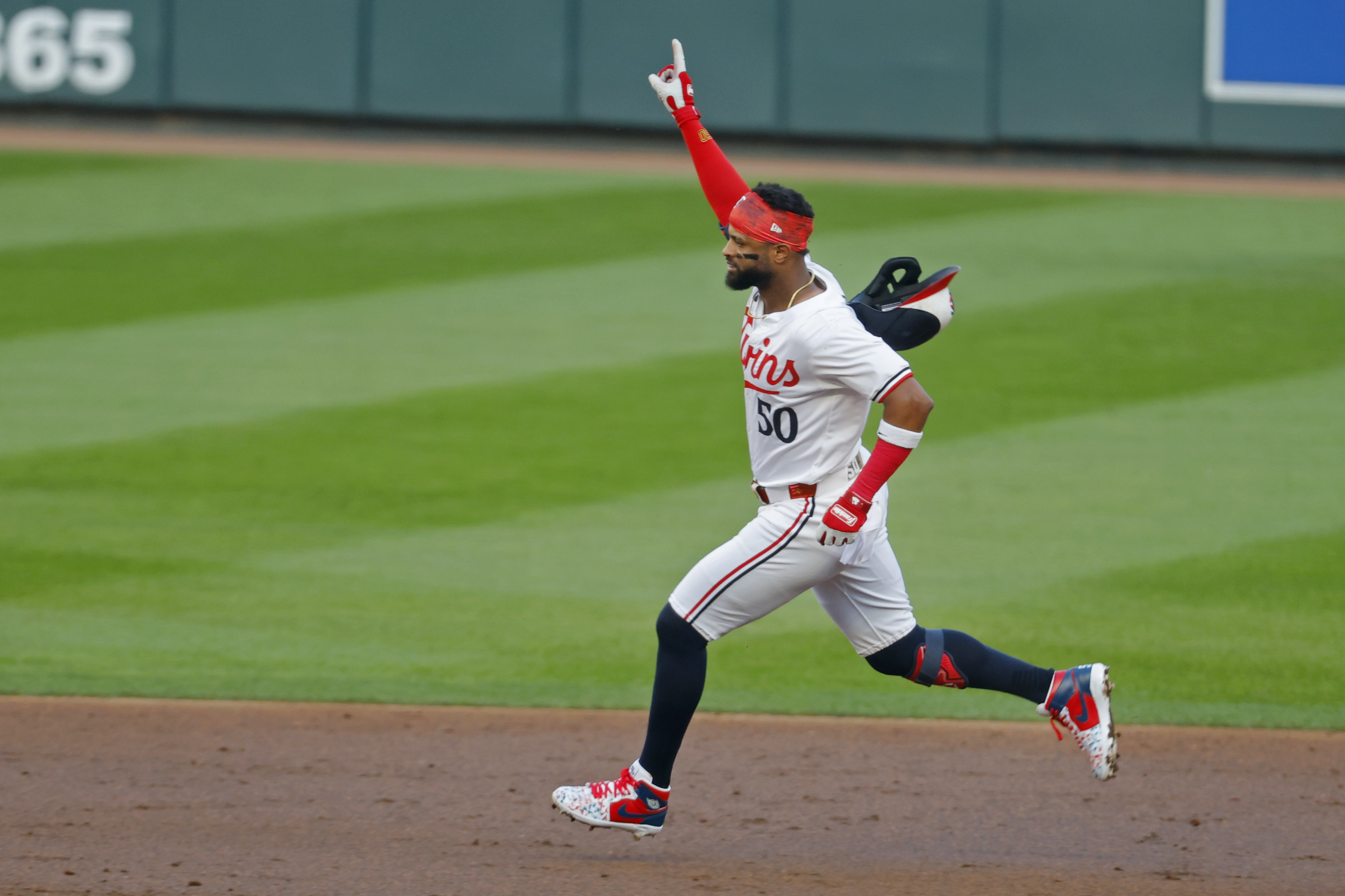 Minnesota Twins' Willi Castro runs the bases on his three-run home run against the Kansas City Royals in the second inning of a baseball game Monday, Aug. 12, 2024, in Minneapolis.