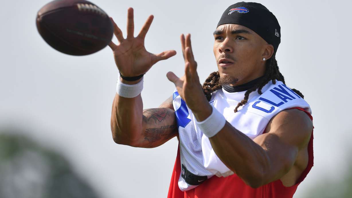 FILE - Buffalo Bills wide receiver Chase Claypool (14) catches a pass during an NFL football training camp practice in Pittsford, N.Y., Wednesday, July 24, 2024.