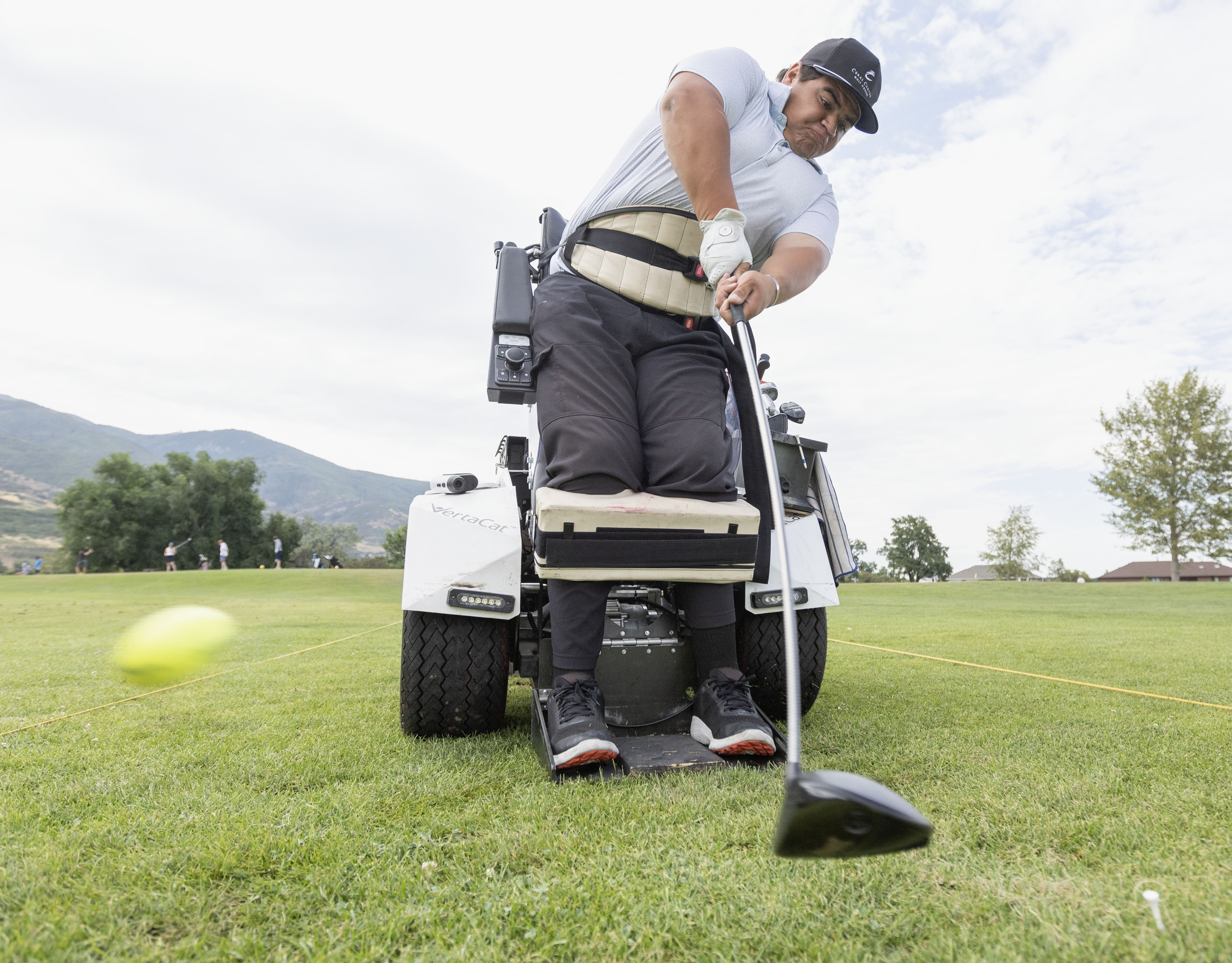 Max Togisala, champion adaptive golfer, hits a drive while practicing at Valley View Golf Course in Layton on July 25.