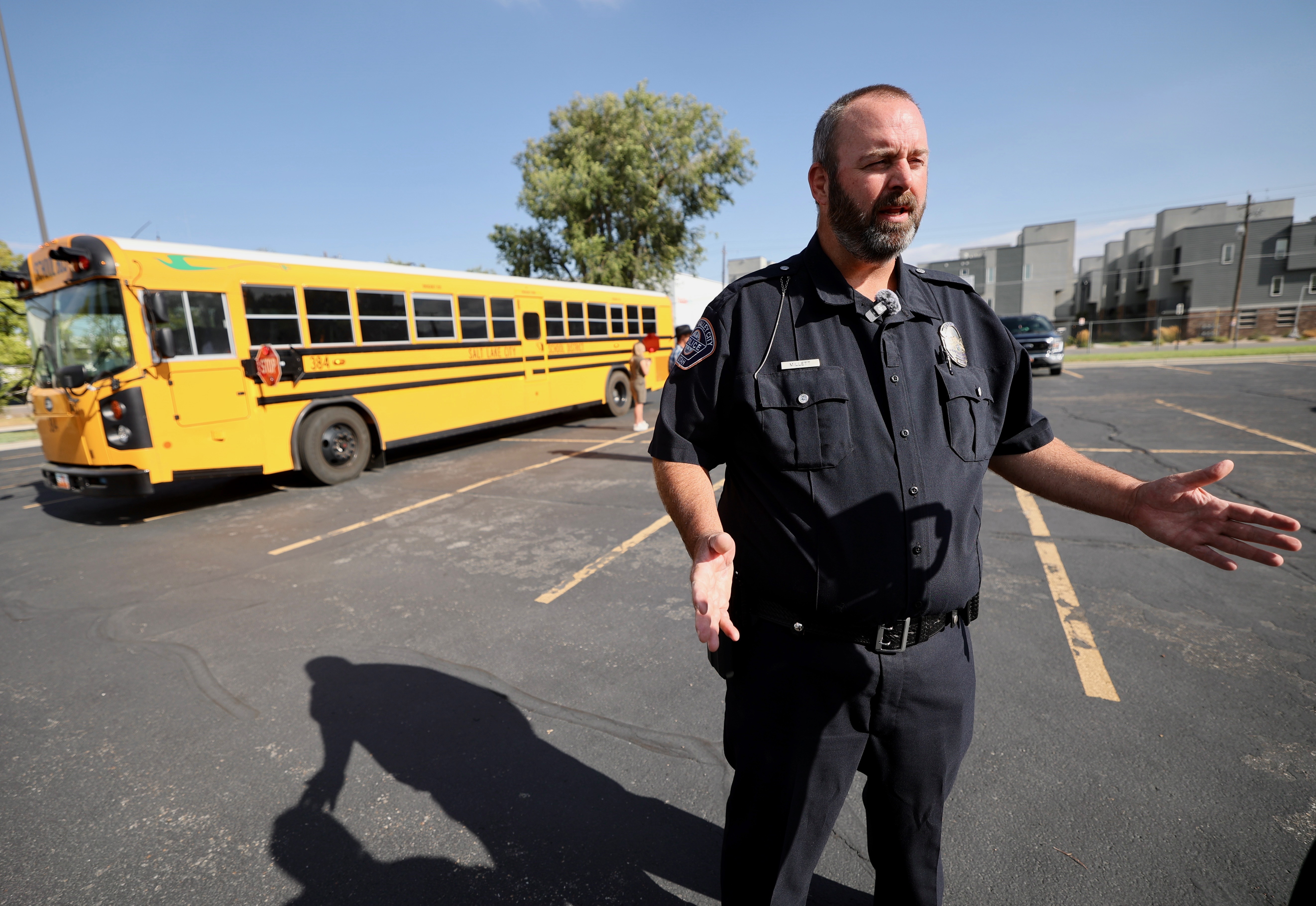 West Valley police detective Mike Millett speaks Tuesday. With the start of a new school year, the Utah transportation and safety officials are urging drivers to safely share the road with school buses.