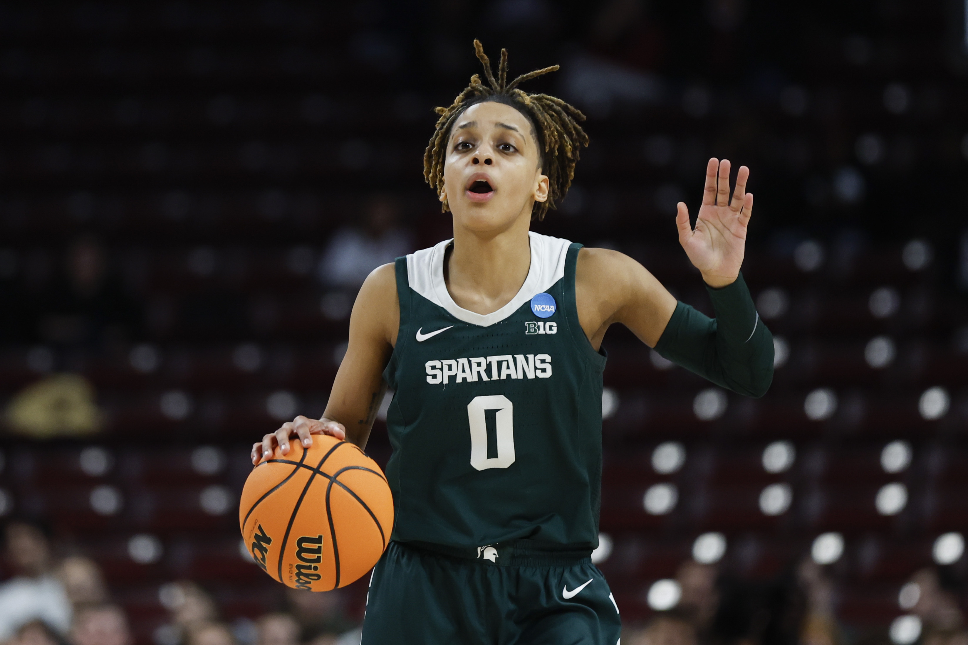 FILE - Michigan State guard DeeDee Hagemann brings the ball up court during the first half of a first-round college basketball game against North Carolina in the women's NCAA Tournament in Columbia, S.C., Friday, March 22, 2024. 