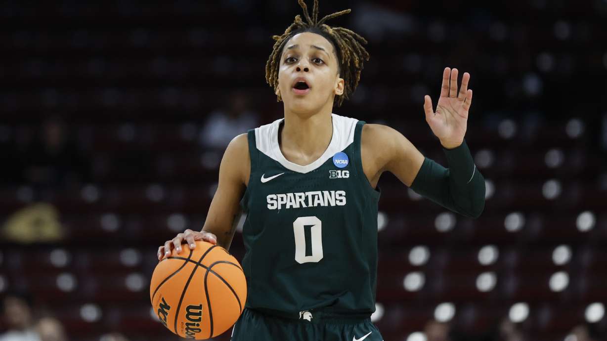 FILE - Michigan State guard DeeDee Hagemann brings the ball up court during the first half of a first-round college basketball game against North Carolina in the women's NCAA Tournament in Columbia, S.C., Friday, March 22, 2024.