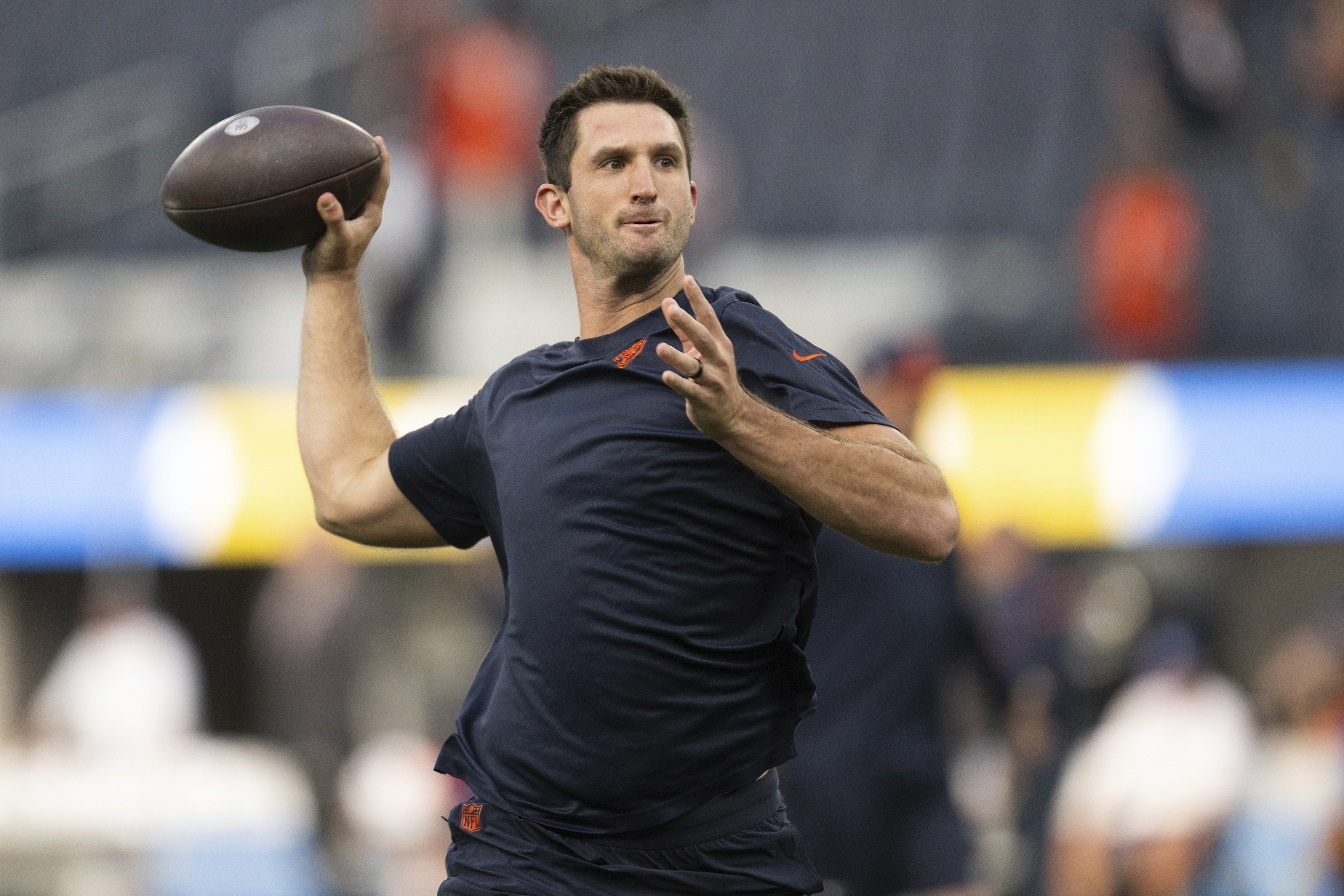 FILE - Then-Chicago Bears quarterback Nathan Peterman (14) warms up before an NFL football game against the Los Angeles Chargers, Sunday, Oct. 29, 2023, in Inglewood, Calif. 