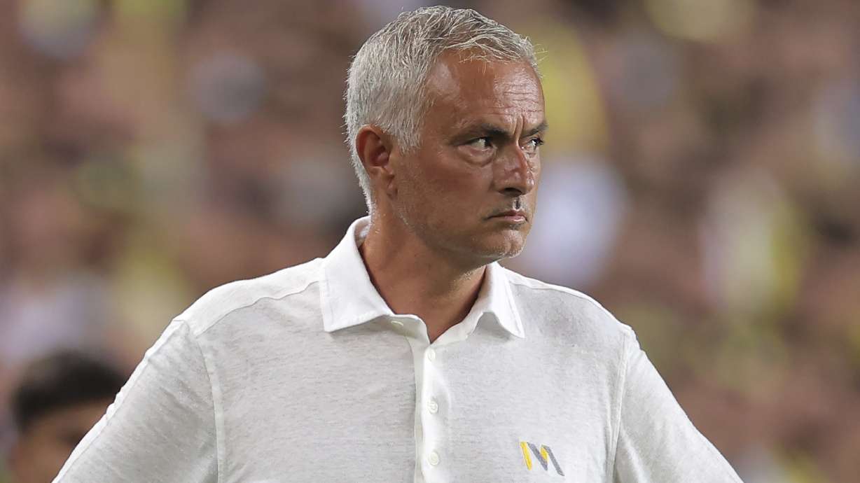 Fenerbahce's head coach Jose Mourinho stands on the pitch during the Turkish Super Lig soccer match between Fenerbahce and Adana Demirspor in Istanbul, Saturday, Aug. 10, 2024.