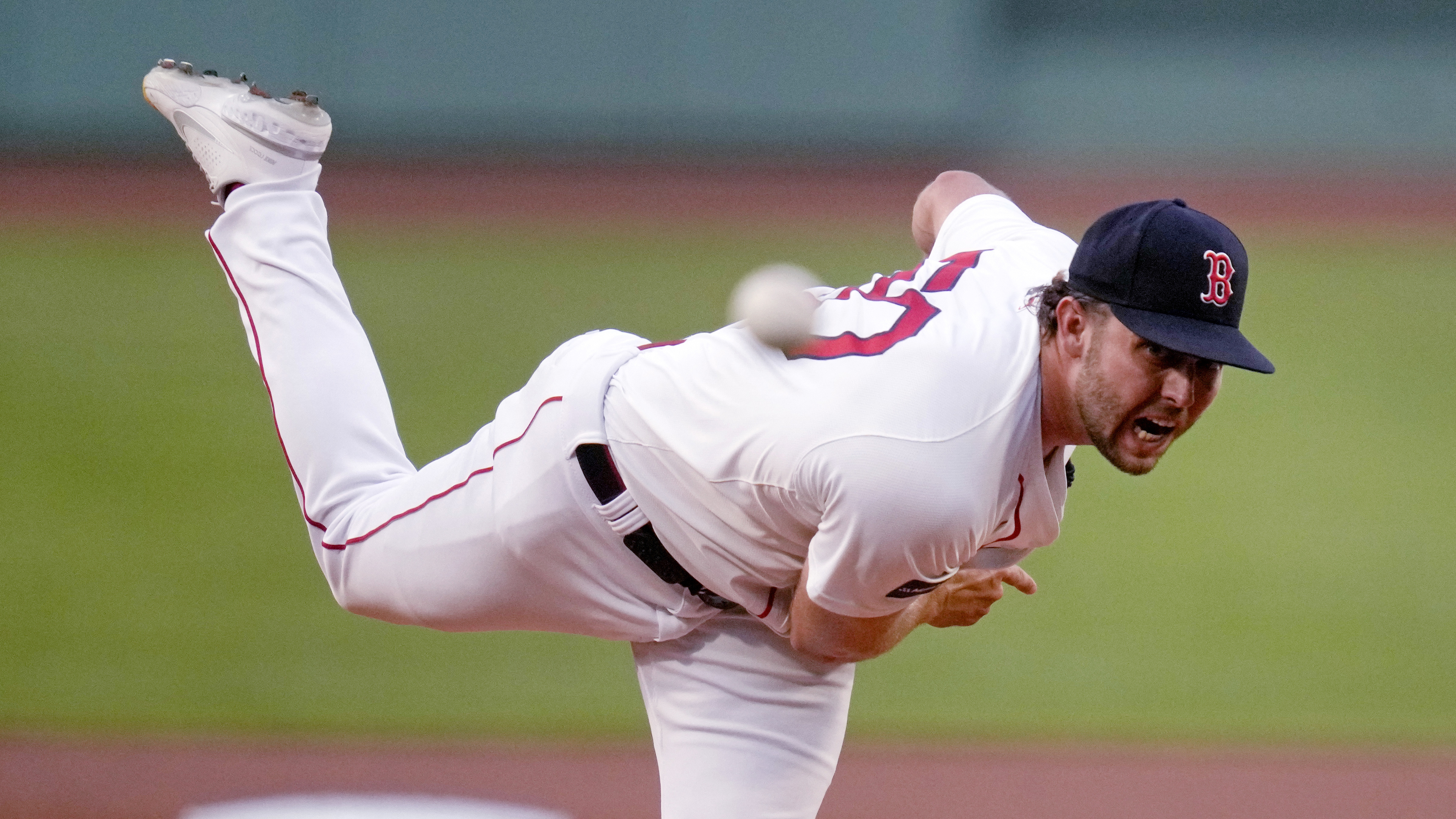 Boston Red Sox pitcher Kutter Crawford delivers during the first inning of a baseball game against the Texas Rangers at Fenway Park, Tuesday, Aug. 13, 2024, in Boston. 