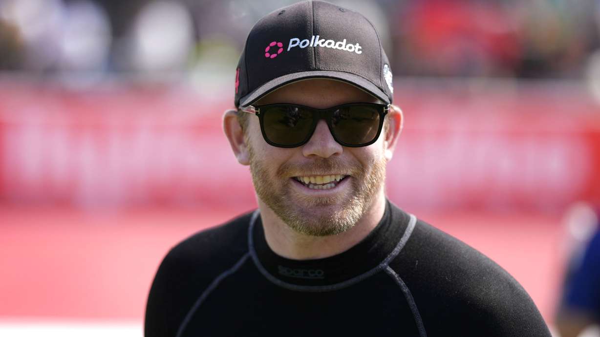 FILE - Conor Daly walks to driver introductions before an IndyCar auto race, Sunday, July 14, 2024, at Iowa Speedway in Newton, Iowa.