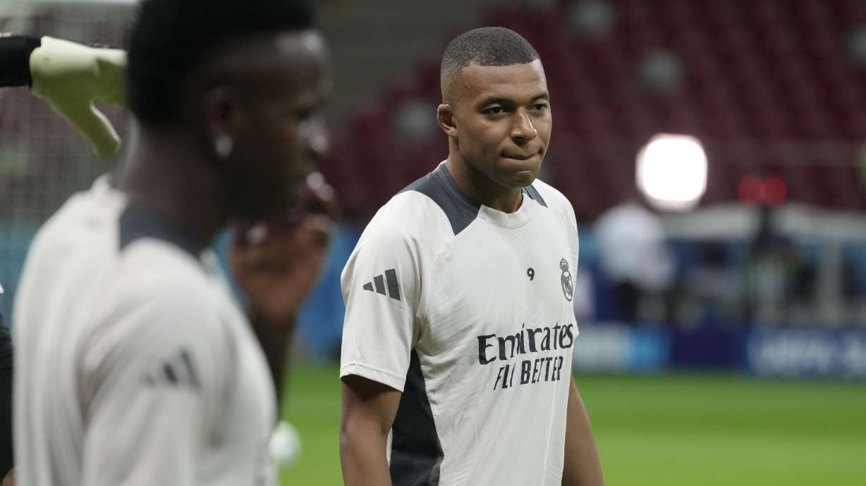 Real Madrid's Kylian Mbappe attends a training session ahead of the UEFA Super Cup Final soccer match between Real Madrid and Atalanta at the Narodowy stadium in Warsaw, Poland, Tuesday, Aug. 13, 2024.