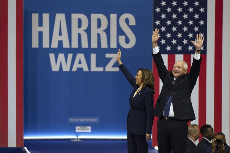 Democratic presidential nominee Vice President Kamala Harris and her running mate Minnesota Gov. Tim Walz arrive for a campaign rally in Philadelphia, Pa., Aug. 6.