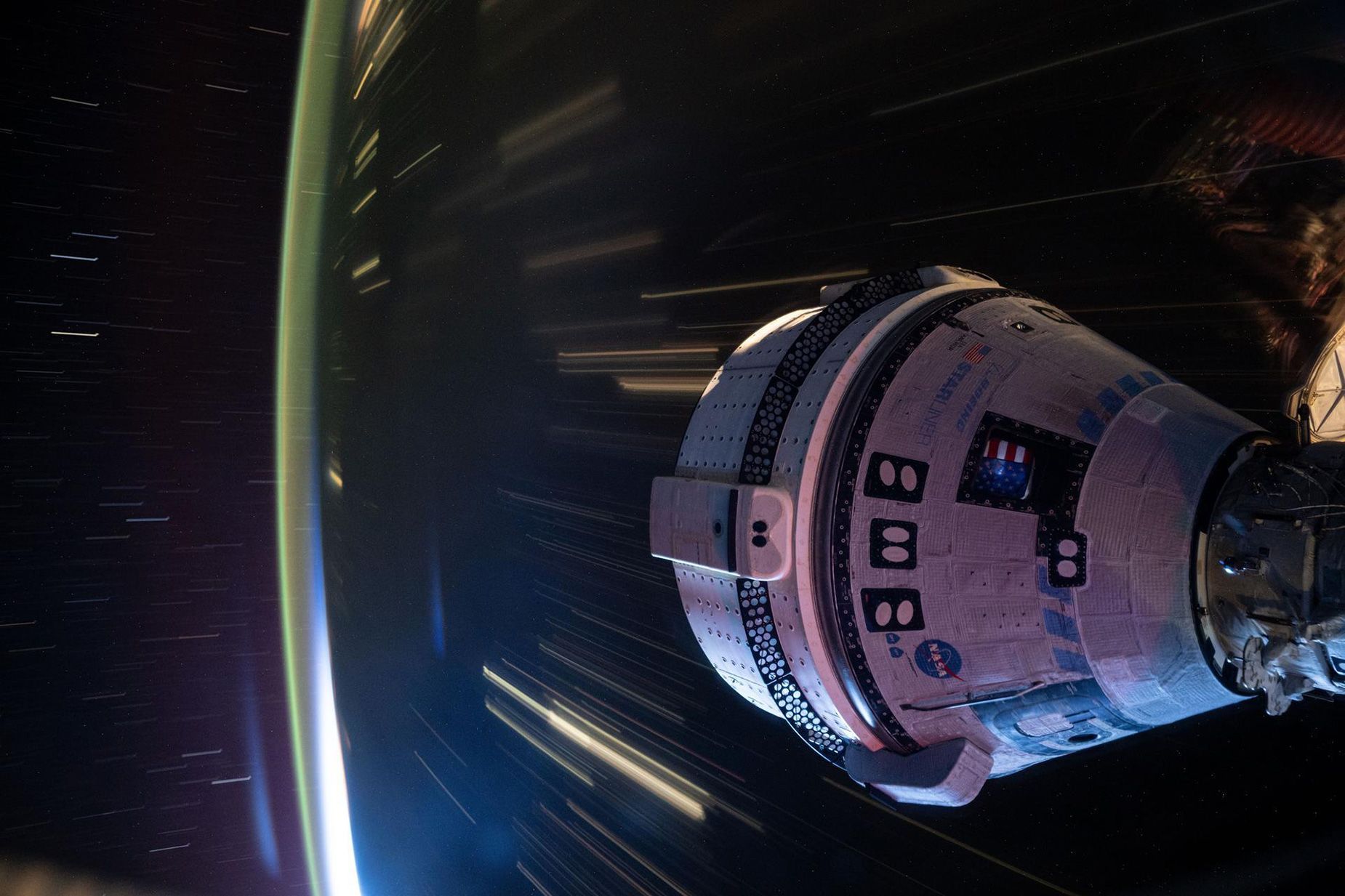 Boeing’s Starliner spacecraft that launched NASA’s Crew Flight Test astronauts Butch Wilmore and Suni Williams to the International Space Station is seen docked to the space station's Harmony module.