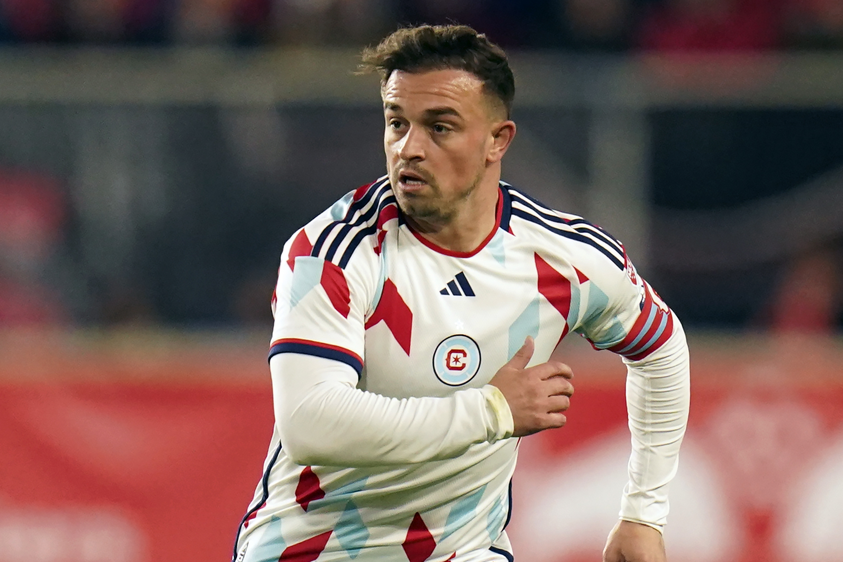 FILE - Chicago Fire midfielder Xherdan Shaqiri (10) runs during an MLS soccer match against the New York Red Bulls, Saturday, April 13, 2024 in Harrison, N.J. 