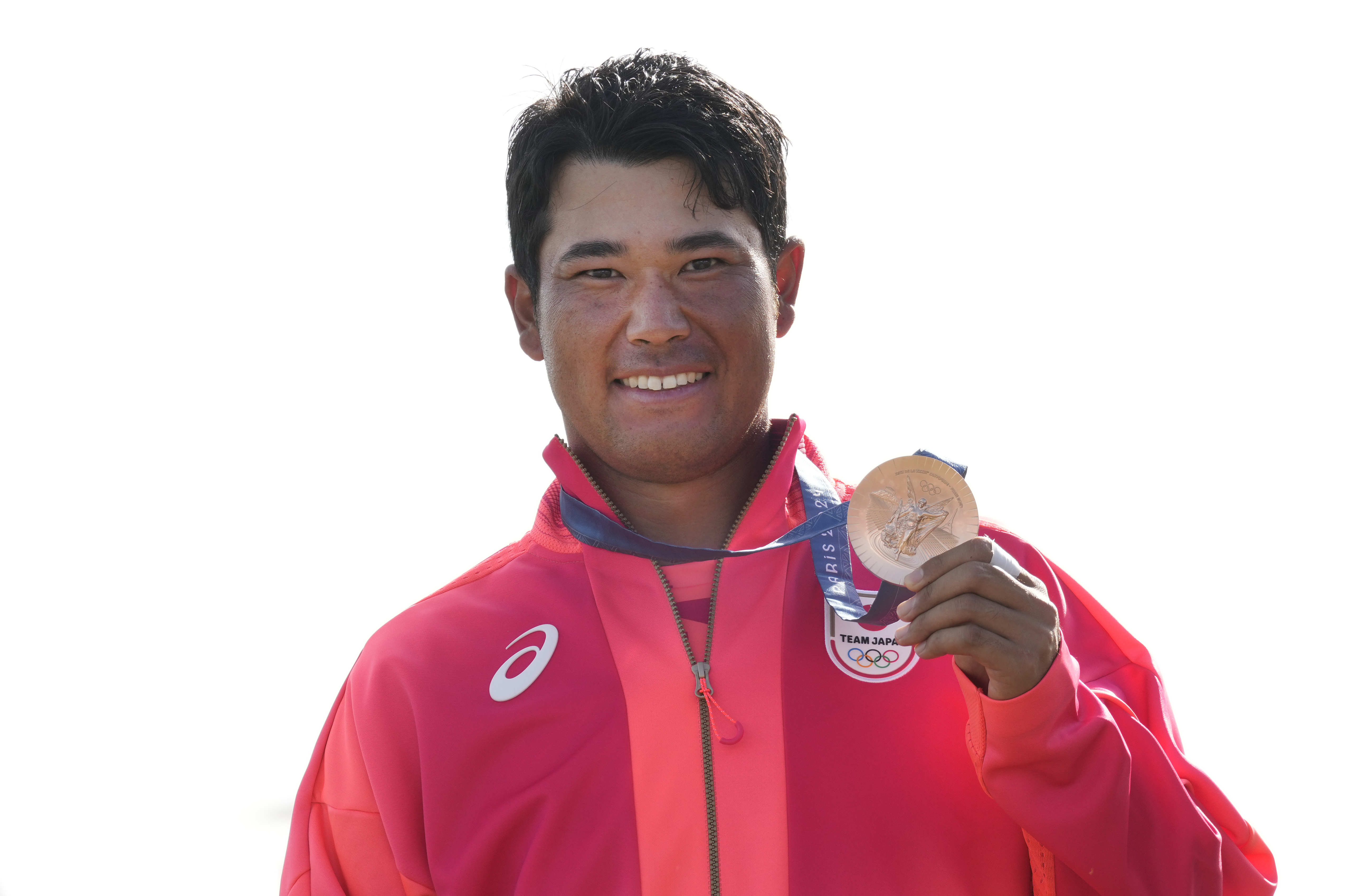 Hideki Matsuyama, of Japan, pose with his bronze medal following the medal ceremony for the men's golf at the 2024 Summer Olympics, Sunday, Aug. 4, 2024, at Le Golf National in Saint-Quentin-en-Yvelines, France. Scottie Scheffler, of the United States, won the gold medal with Tommy Fleetwood, of Britain, silver. 