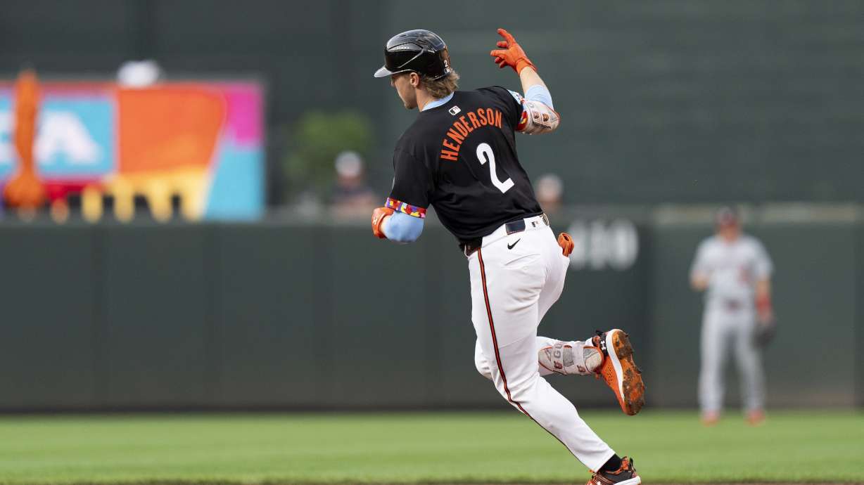 Baltimore Orioles' Gunnar Henderson (2) rounds the bases after hitting a home run during the first inning of a baseball game against the Washington Nationals, Wednesday, Aug. 14, 2024, in Baltimore.