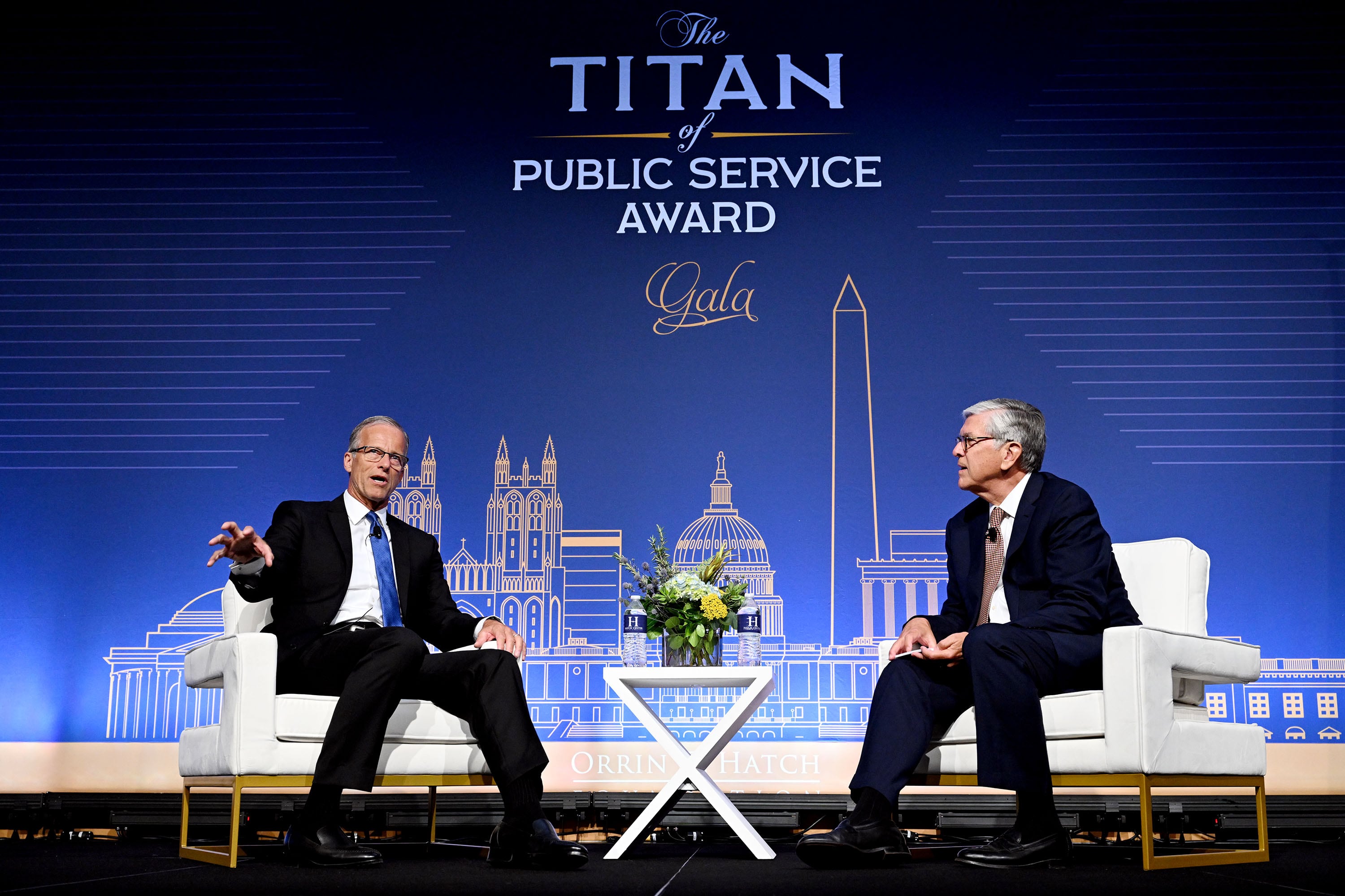 Senate Republican Whip John Thune, R-S.D., sits down for a fireside chat with former U.S. Sen. Gordon H. Smith, R-Ore., prior to receiving the Titan of Public Service Award during a special gala event of the Orrin G. Hatch Foundation at Salt Lake City's Grand America on Wednesday.