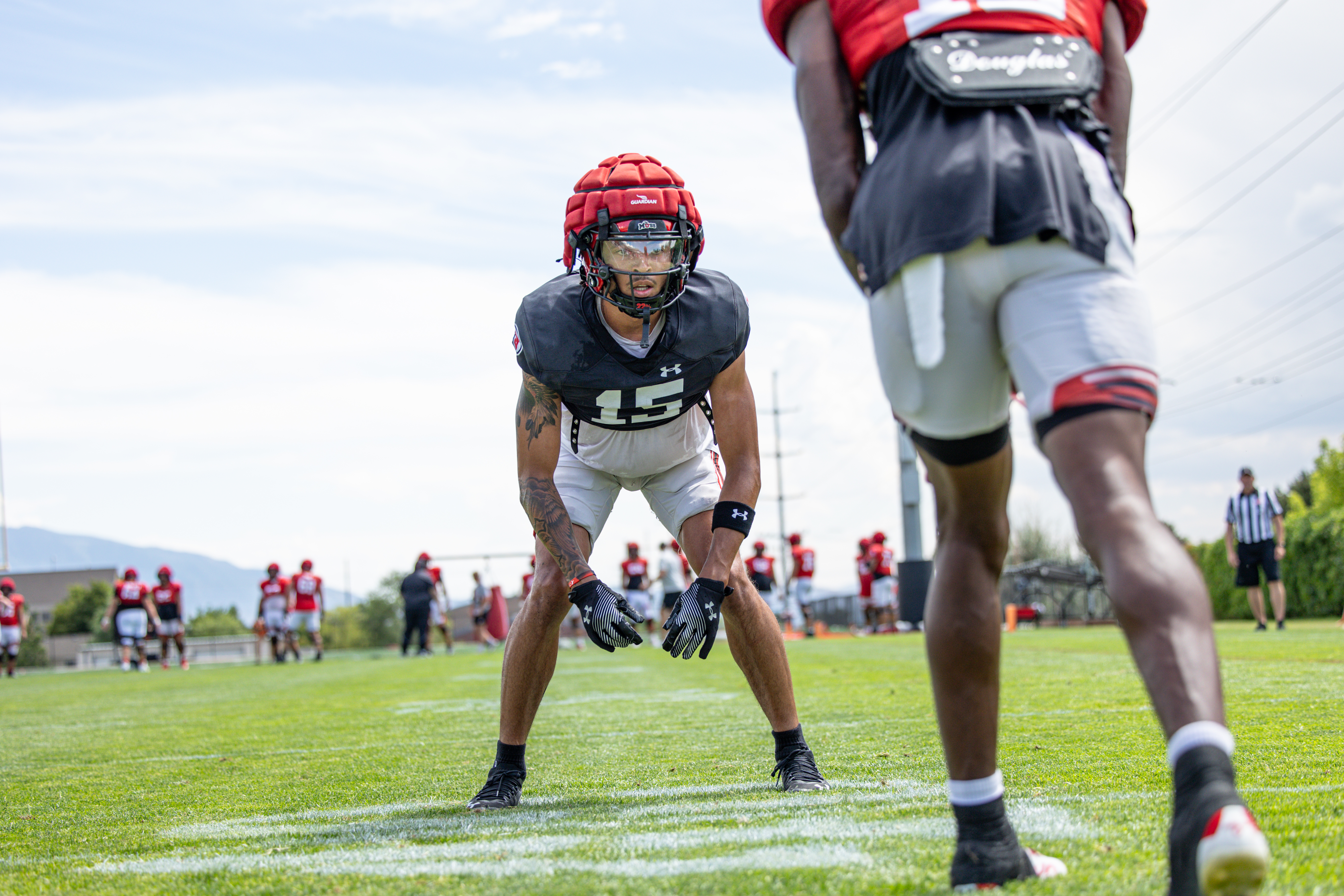 Safety Tao Johnson lines up during practice as part of Utah's fall camp period on Aug. 8, 2024.