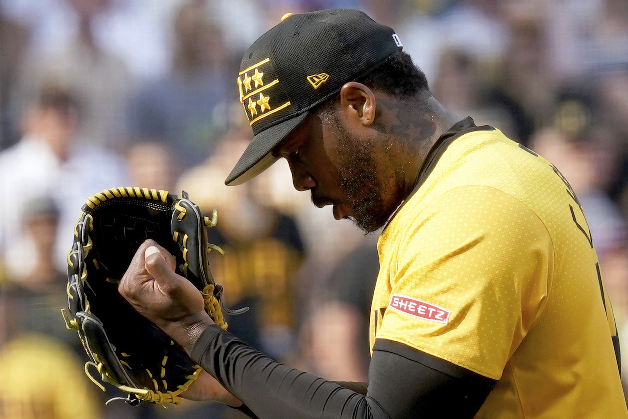 Pittsburgh Pirates relief pitcher Aroldis Chapman reacts after getting the final out of a win over the Tampa Bay Rays in a baseball game Saturday, June 22, 2024, in Pittsburgh. A business subsidiary of the Major League Baseball Players Association sued the Pittsburgh Pirates’ parent company and the grocery chain Sheetz Inc. alleging unlicensed use of players’ names and images on social media. 