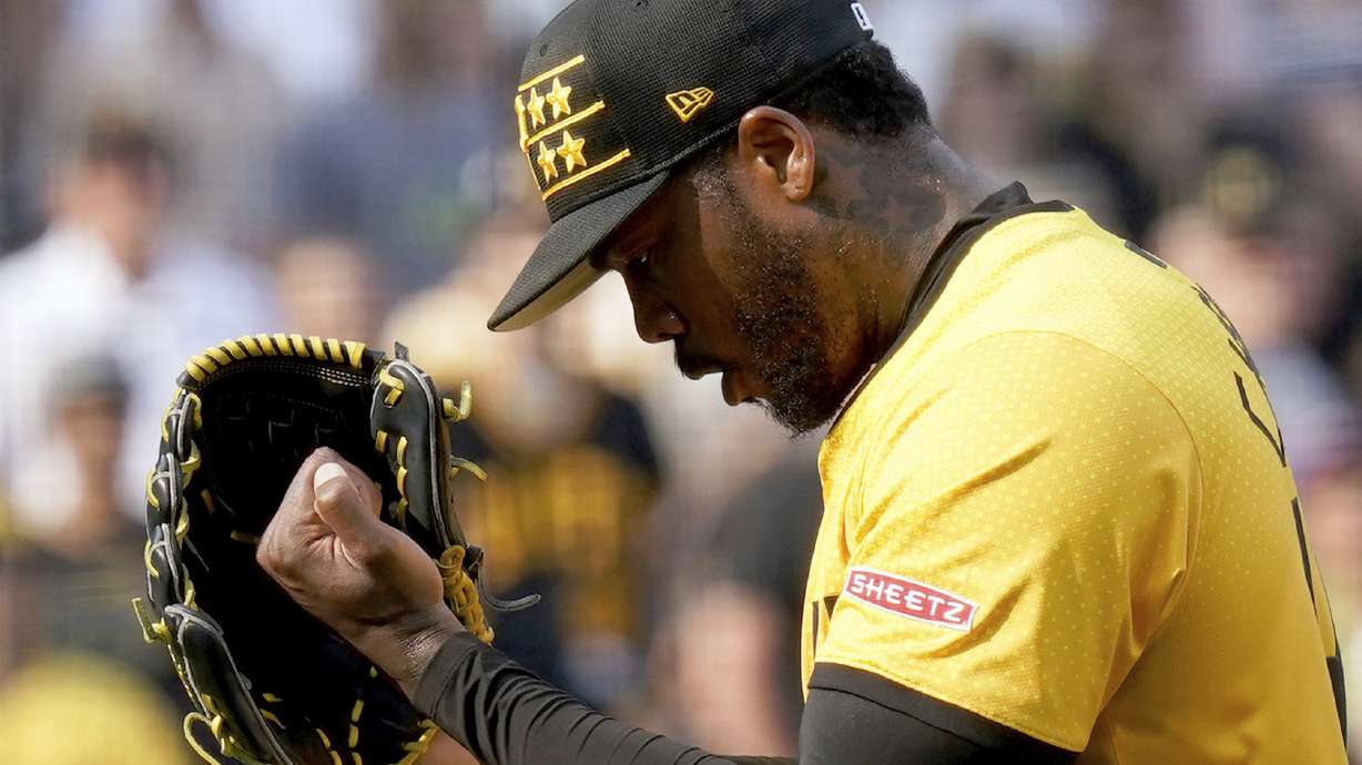 Pittsburgh Pirates relief pitcher Aroldis Chapman reacts after getting the final out of a win over the Tampa Bay Rays in a baseball game Saturday, June 22, 2024, in Pittsburgh. A business subsidiary of the Major League Baseball Players Association sued the Pittsburgh Pirates’ parent company and the grocery chain Sheetz Inc. alleging unlicensed use of players’ names and images on social media.