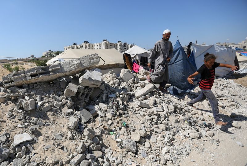 Displaced Palestinians shelter Aug. 15 as Gaza health ministry announced a death toll has surpassed 40,000, amid the Israel-Hamas conflict, in the southern Gaza Strip.