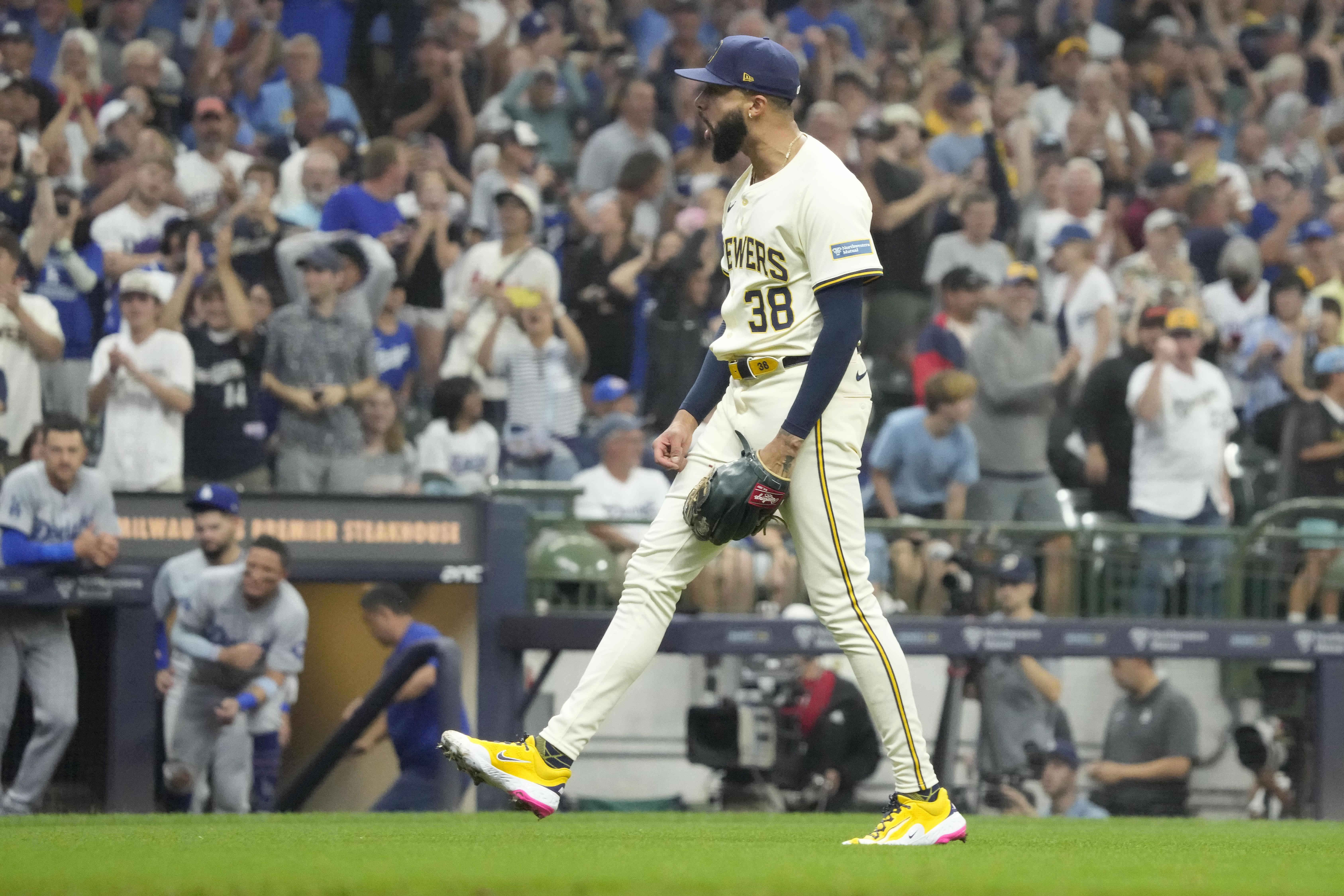 Milwaukee Brewers pitcher Devin Williams (38) reacts after striking out Los Angeles Dodgers' Shohei Ohtani for the final out in the ninth inning of a baseball game, Thursday, Aug. 15, 2024, in Milwaukee. 