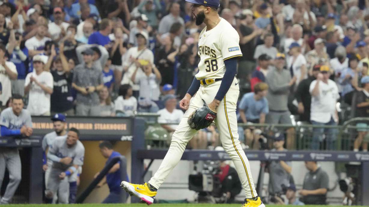 Milwaukee Brewers pitcher Devin Williams (38) reacts after striking out Los Angeles Dodgers' Shohei Ohtani for the final out in the ninth inning of a baseball game, Thursday, Aug. 15, 2024, in Milwaukee.