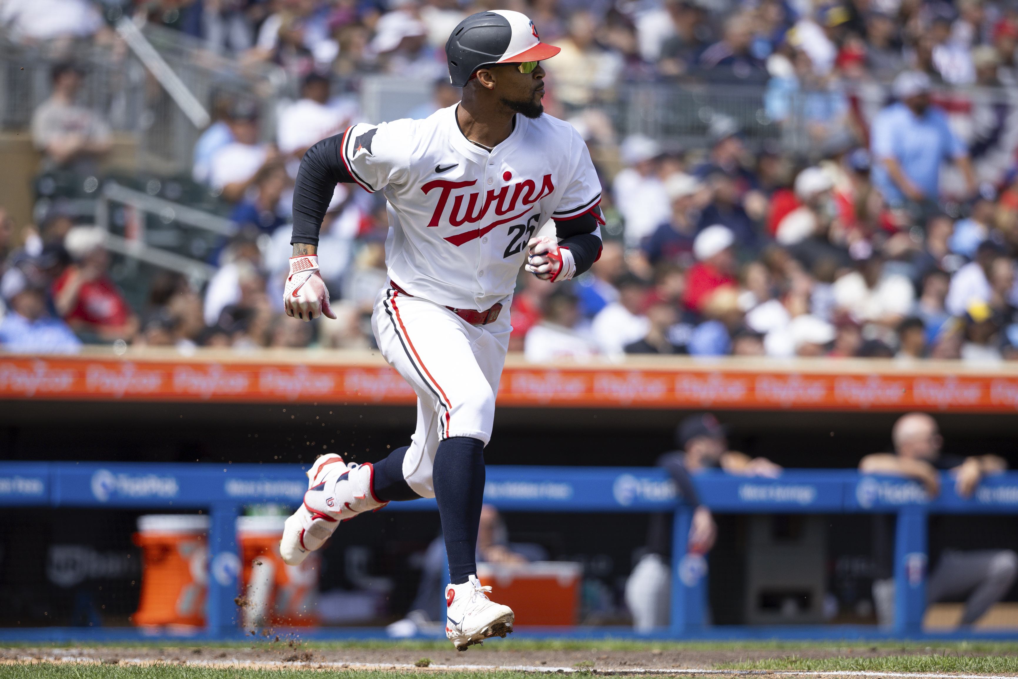 Minnesota Twins' Byron Buxton runs the bases after hitting a double against the Cleveland Guardians during the sixth inning of the first game of a baseball doubleheader, Friday, Aug. 9, 2024, in Minneapolis.