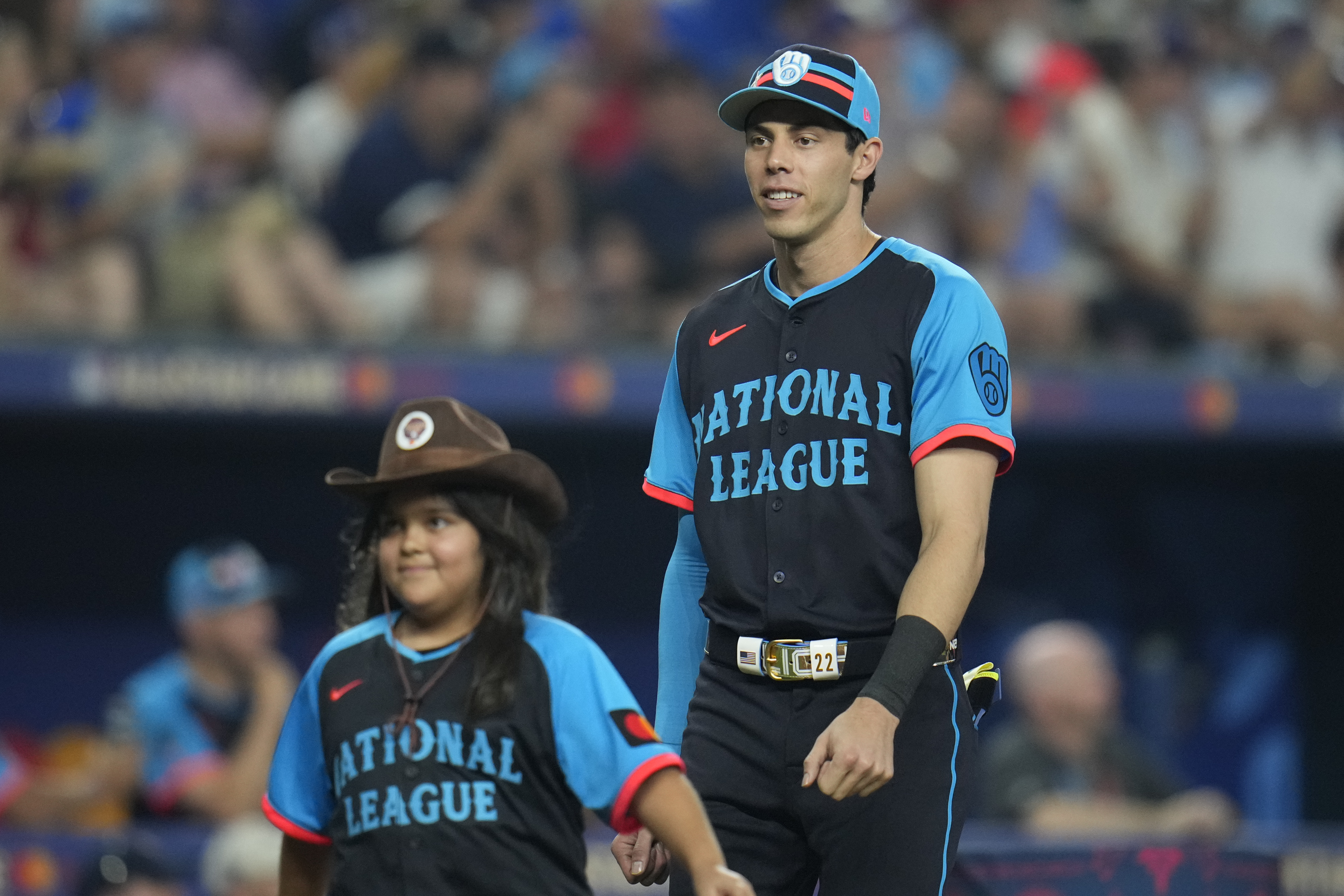 National League's Christian Yelich, of the Milwaukee Brewers, smiles during player introductions before the MLB All-Star baseball game, Tuesday, July 16, 2024, in Arlington, Texas.