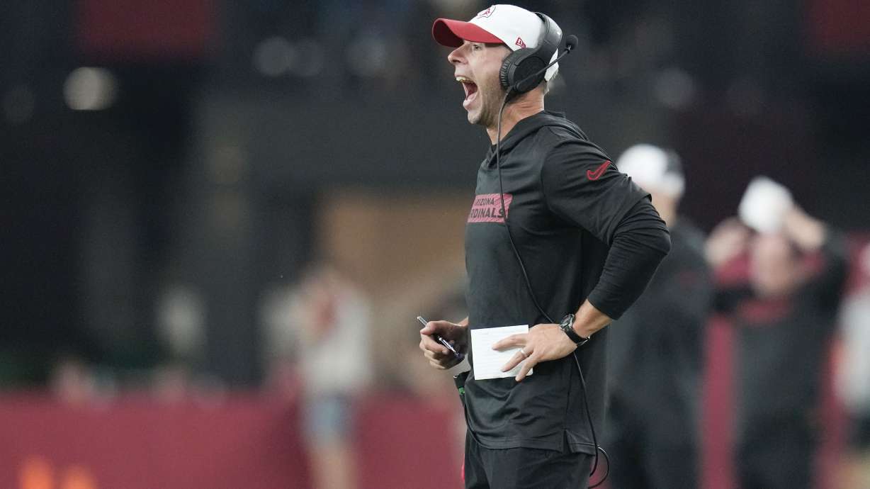 Arizona Cardinals head coach Jonathan Gannon calls out from the sideleinein the first half of a preseason NFL football game against the New Orleans Saints, Saturday, Aug. 10, 2024, in Glendale, Ariz.