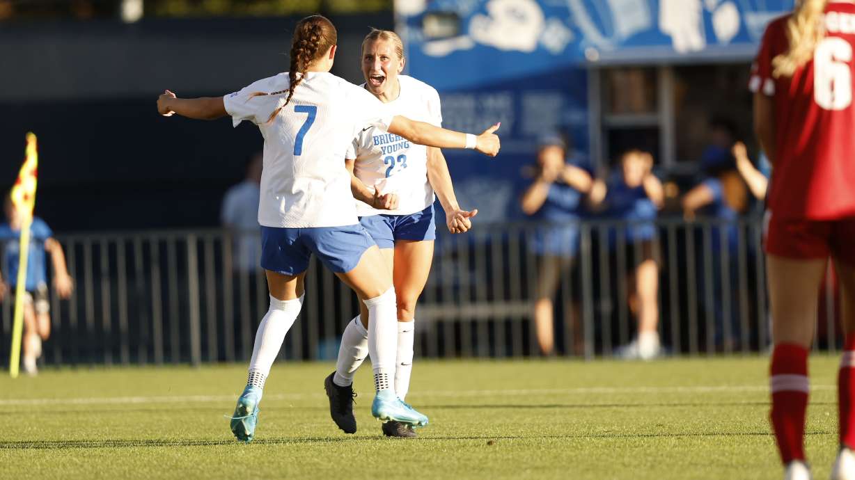 BYU forward Allie Fryer celebrates her go-ahead goal with teammate Erin Bailey (7) during a 1-0 win over No. 19 Wisconsin, Thursday, Aug. 15, 2024 at South Field in Provo.
