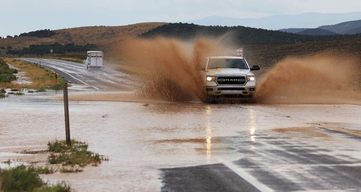 Motorists make their way on Highway 50 near Scipio after a heavy rain and hail storm on Aug. 13. Last month was Utah's 19th wettest August since 1895.