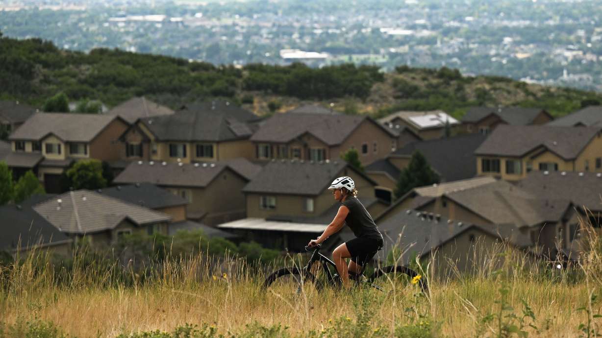 A mountain biker rides the trails in South Maple Hollow in Draper around the Corner Canyon area on Aug. 10.