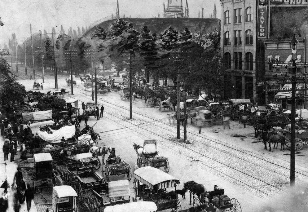 A photo/painting of West Temple created sometime from 1895 to 1910 when sections of the street were made of cobblestone.