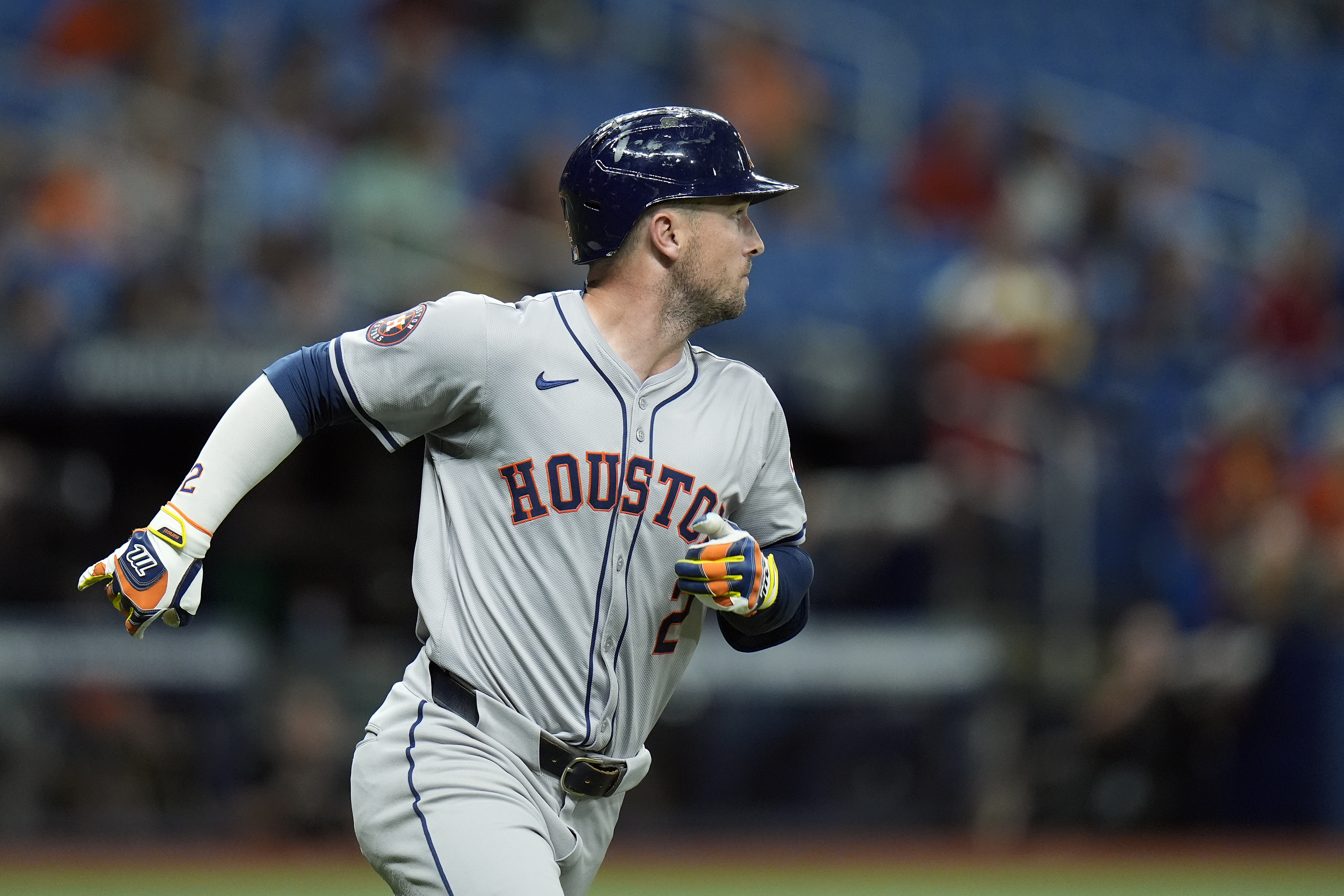Houston Astros' Alex Bregman watches his home run off Tampa Bay Rays starting pitcher Shane Baz during the fifth inning of a baseball game Tuesday, Aug. 13, 2024, in St. Petersburg, Fla. 