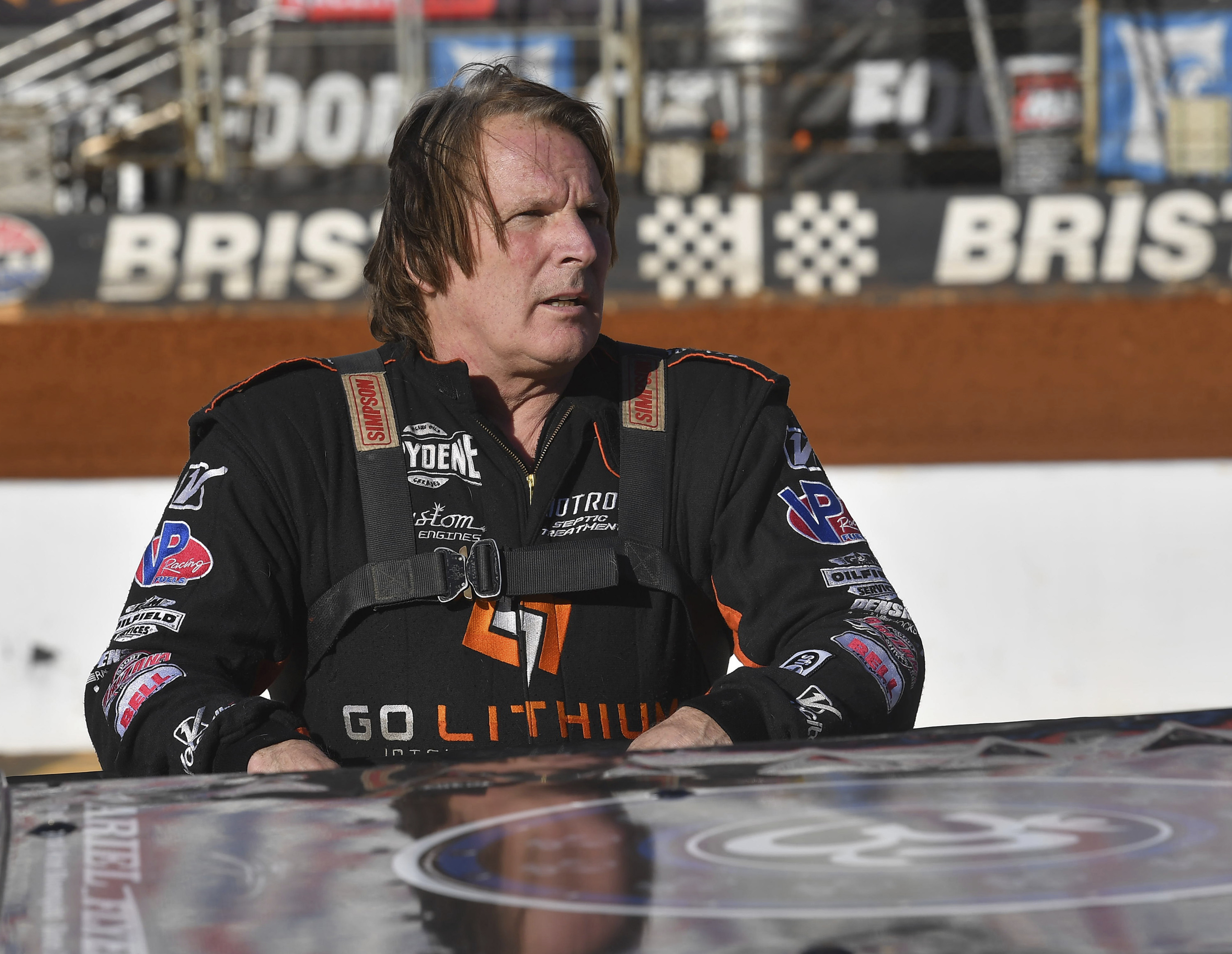 Scott Bloomquist stands beside his car before the Super Late Model division race at the Karl Kustoms Bristol Dirt Nationals, April 1, 2022, at Bristol Motor Speedway in Bristol, Tenn. 