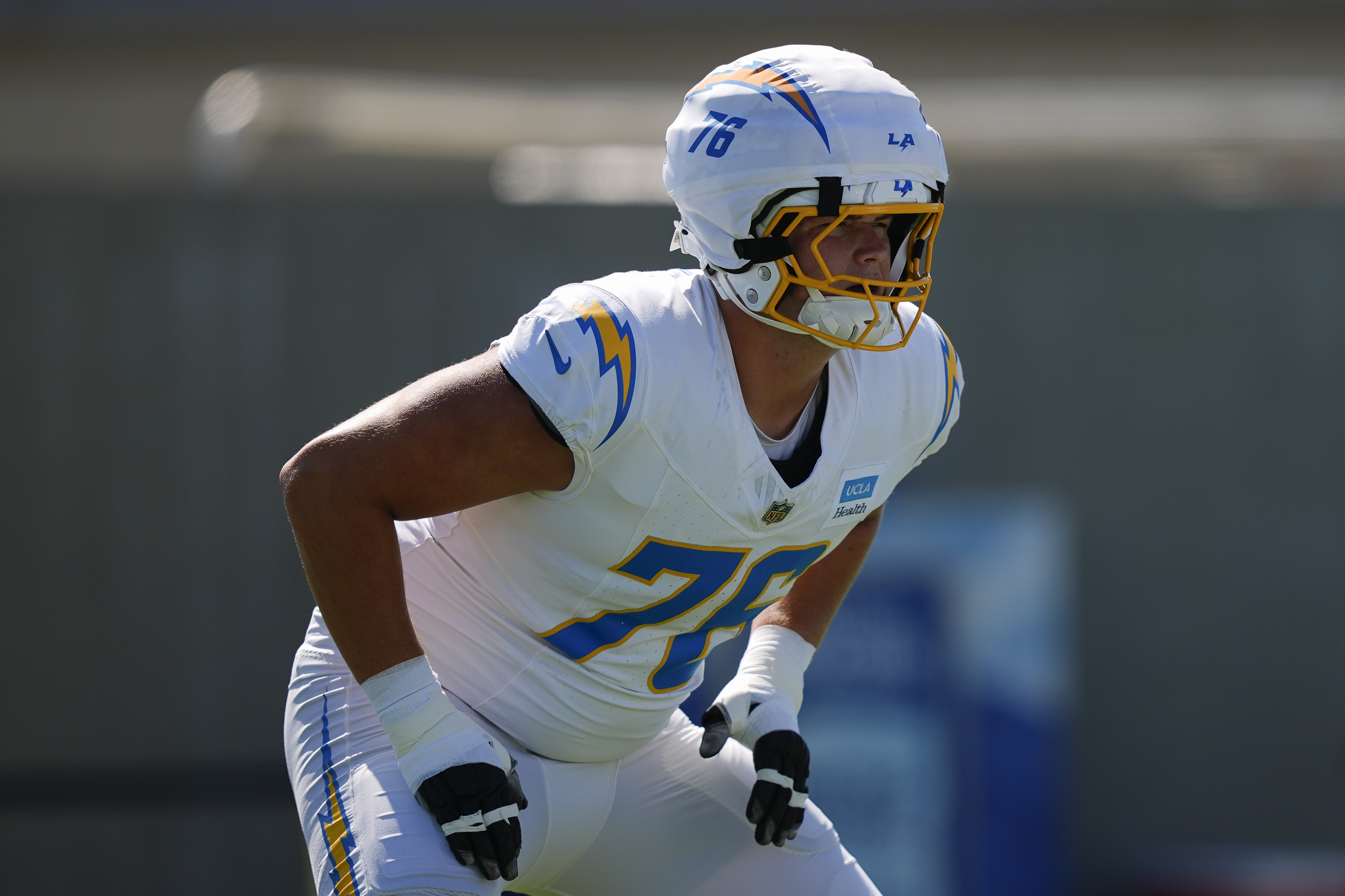 Los Angeles Chargers offensive tackle Joe Alt warms up during NFL football training camp Monday, July 29, 2024, in El Segundo, Calif.
