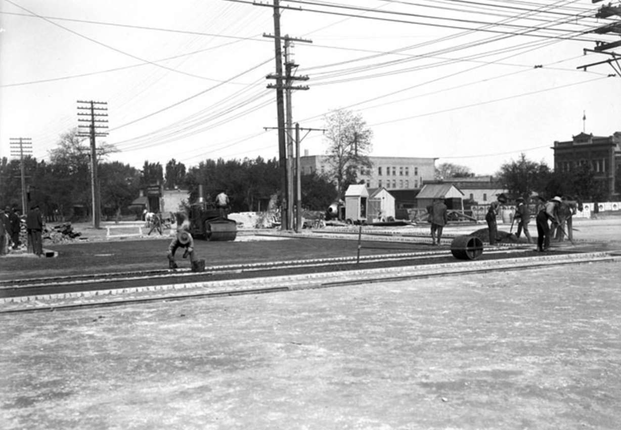Crews work to pave at least a portion of the intersection of West Temple and 300 South in 1908.
