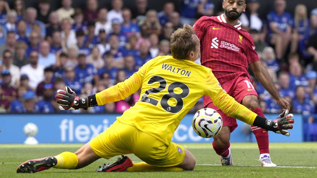 Liverpool's Mohamed Salah scores his side's second goal during the English Premier League soccer match between Ipswich Town and Liverpool at Portman Road stadium in Ipswich, England, Saturday, Aug. 17, 2024.