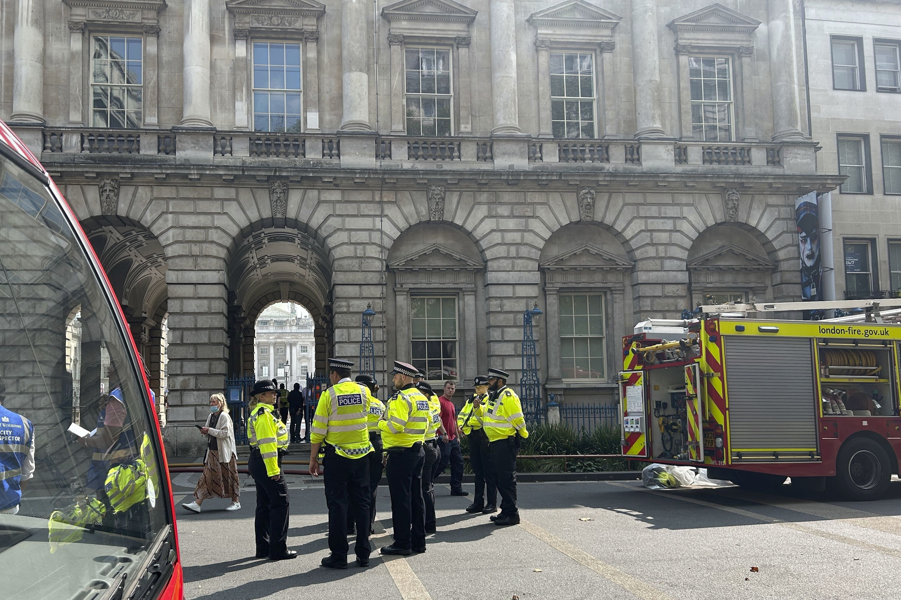 Emergency services work outside Somerset House in central London Saturday after a fire broke out at the large neoclassical arts venue. 