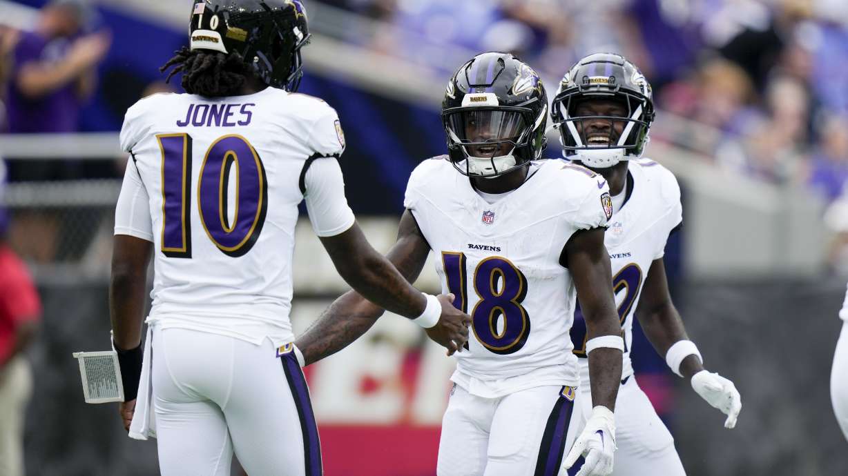 Baltimore Ravens wide receiver Dayton Wade celebrates after scoring with quarterback Emory Jones during the second half of a preseason NFL football game on Saturday, Aug. 17, 2024, in Baltimore.