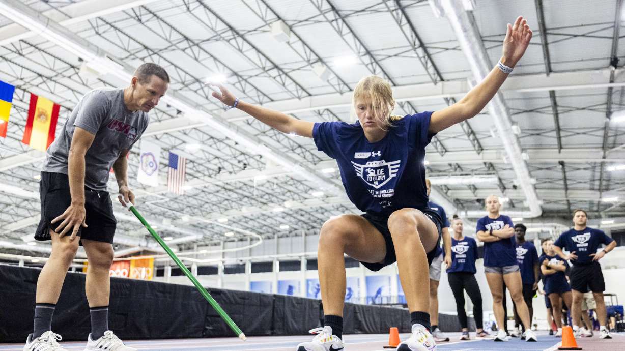 Chelsea Peterson, of Orem, participates in the standing long jump during a recruiting combine for the USA Bobsled and Skeleton Teams held at the Utah Olympic Oval in Kearns on Saturday.